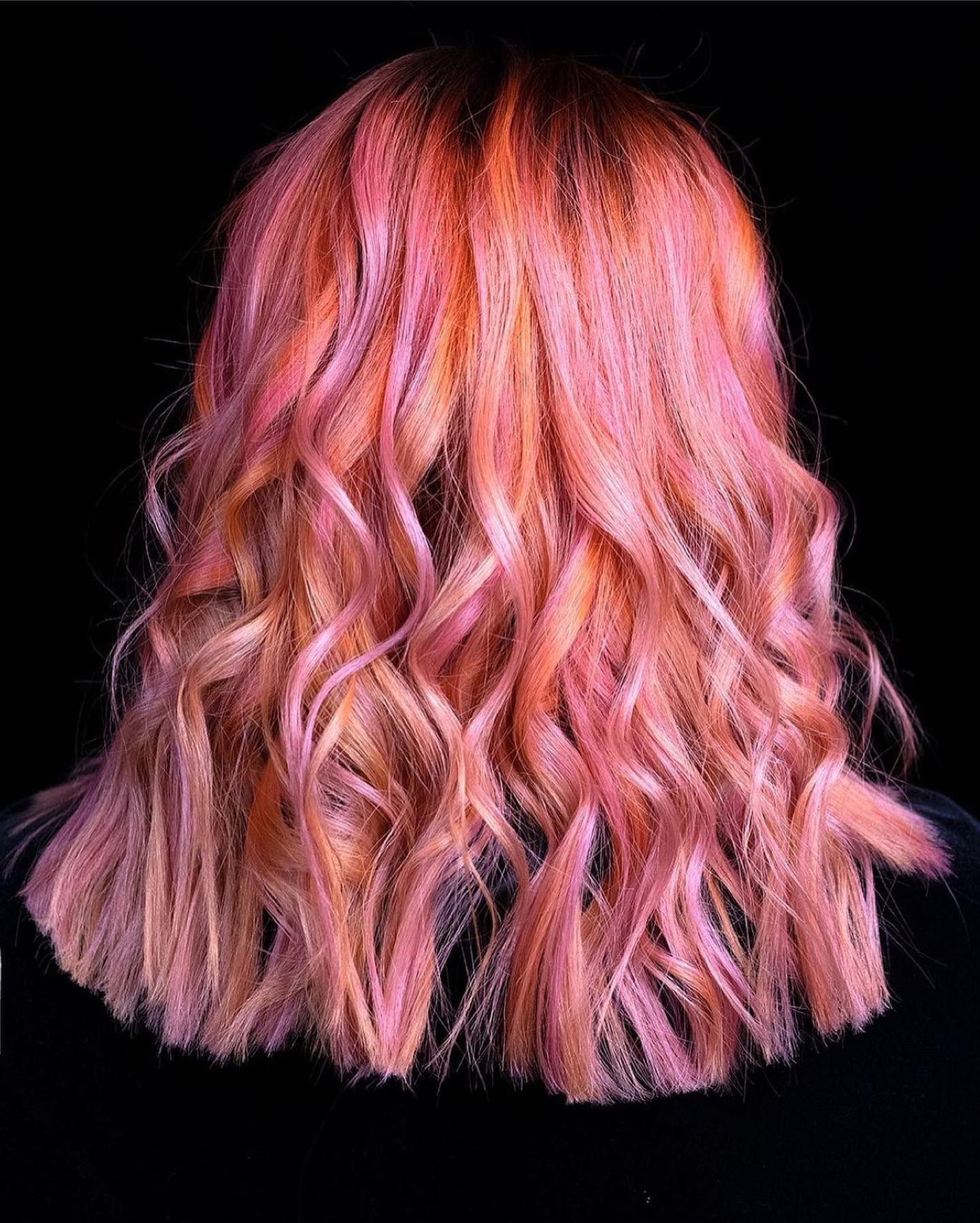 Explore 30 Stunning Coral Pink Hair Ideas for a Trendy Update in 2024