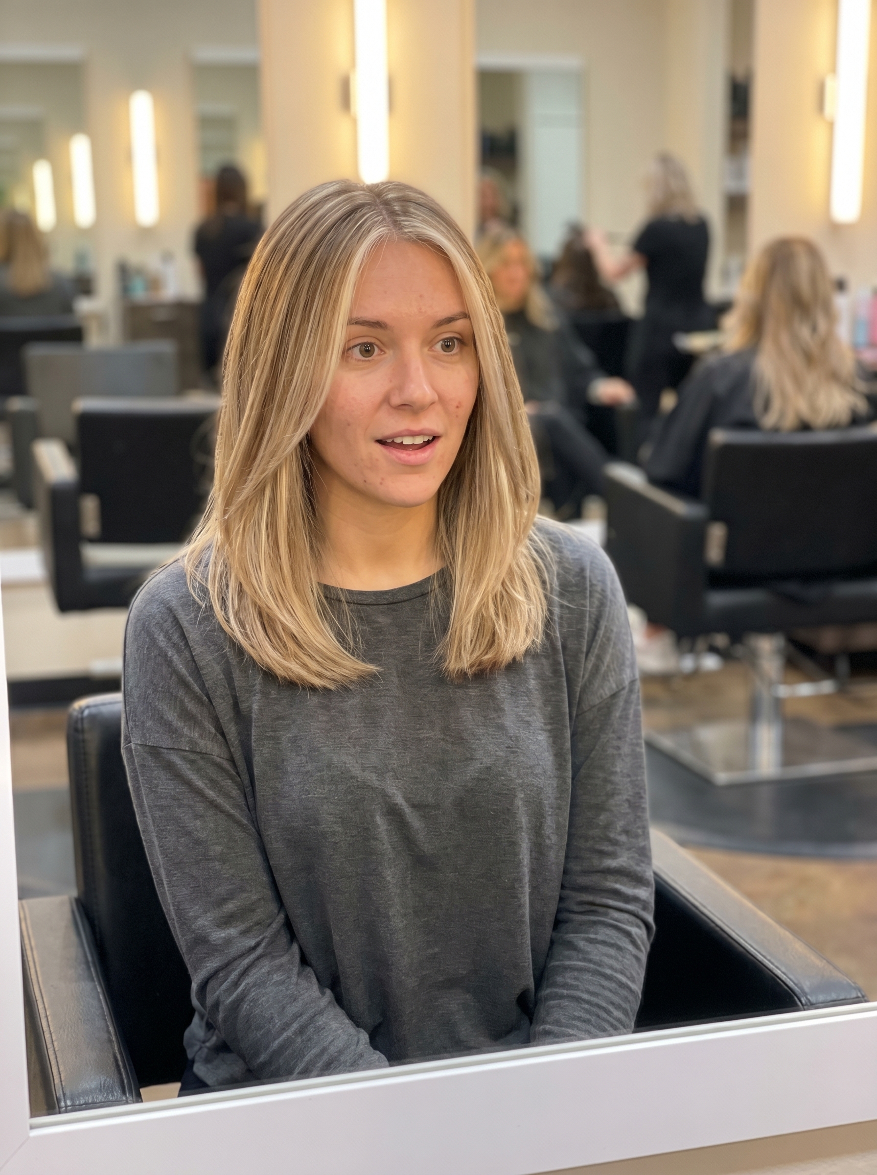 A sophisticated and natural linen balayage with a Scandi hairline, showcasing neutral blonde, sand, and beige tones, representing effortless blonde hair inspo summer 2026. Suitable for all occasions.
