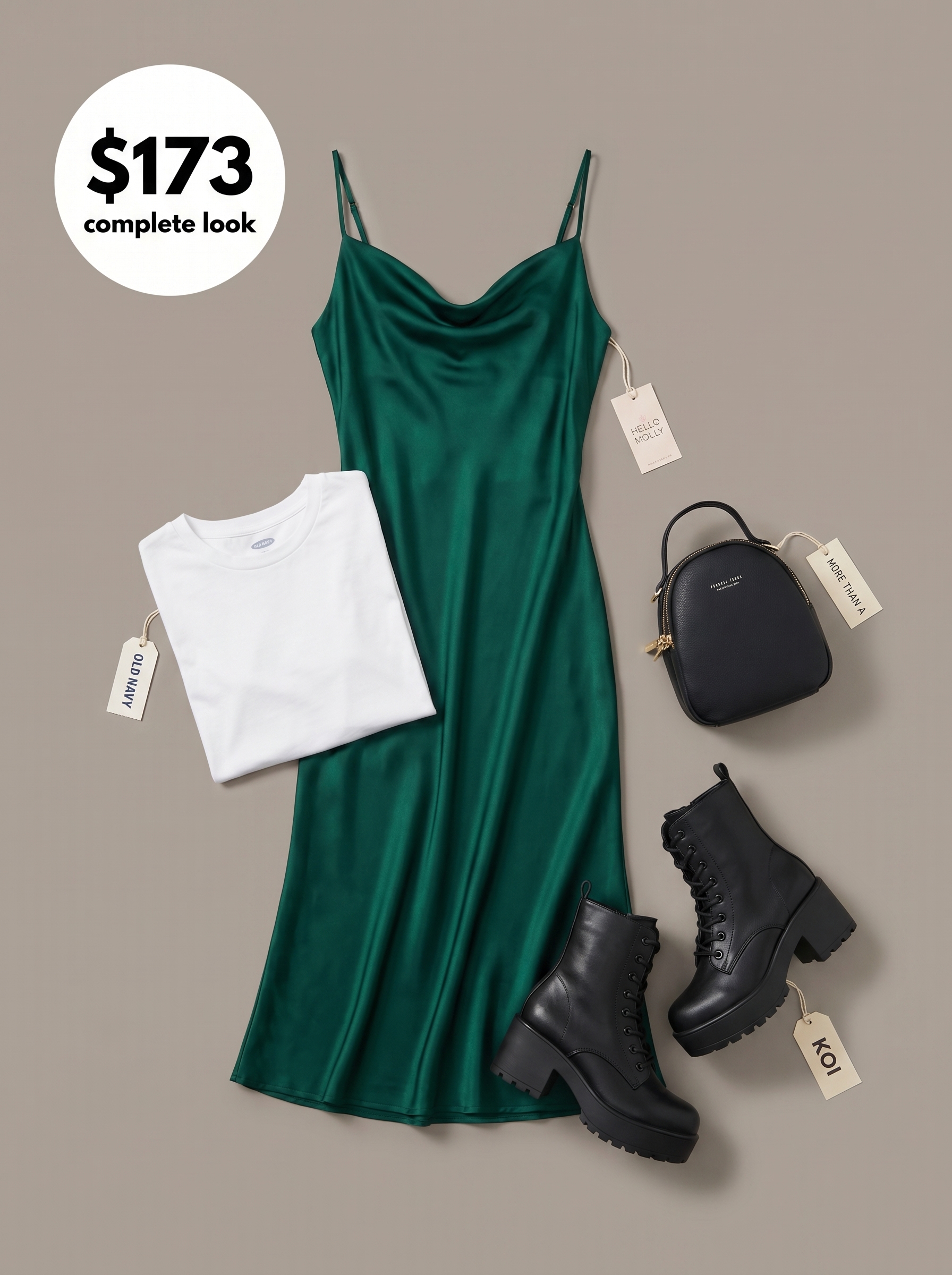 Edgy emerald green satin slip midi dress layered over a white t-shirt, with combat boots for casual summer dresses 2026.
