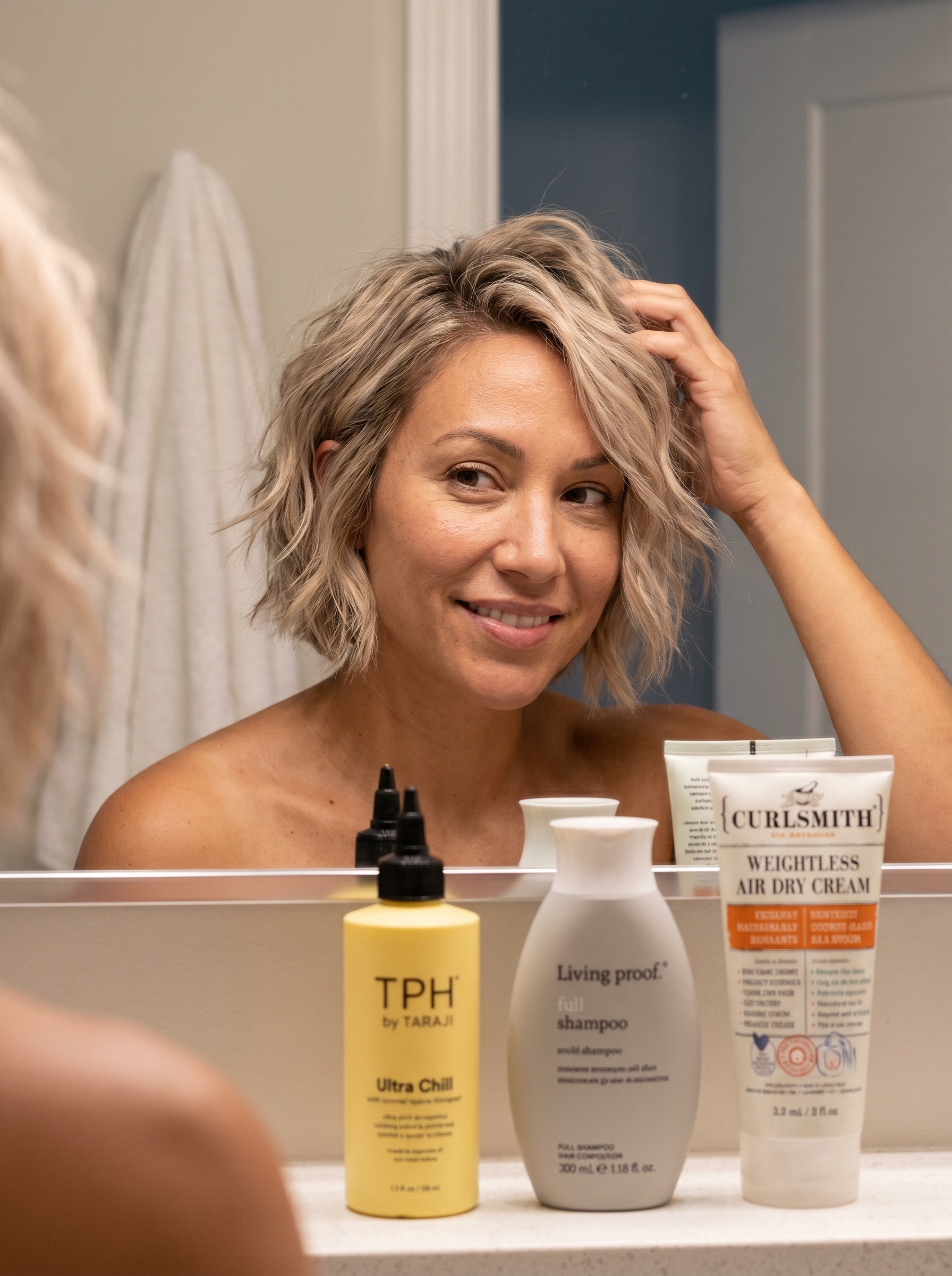 Effortless Scandi-Wave Shag in Linen Blonde, a bohemian and cool style for daily wear, showcasing cool summer hair ideas 2026 and enhanced with curl cream.