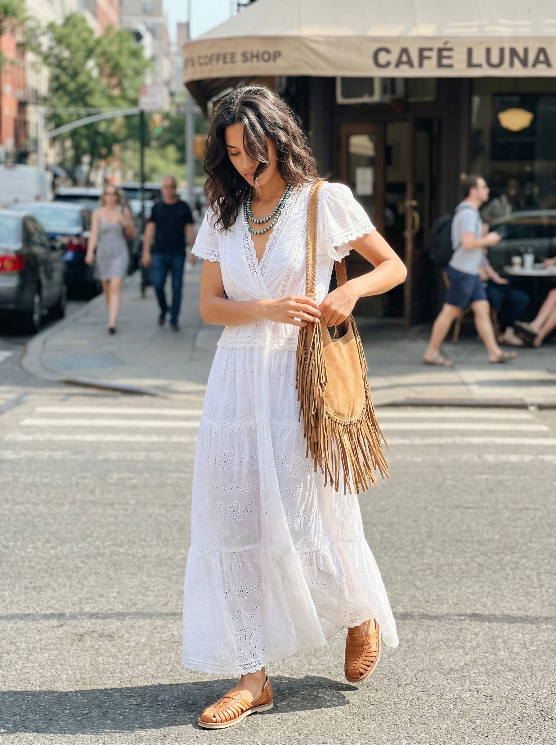 Bohemian Rhapsody Summer Dress 2024 A person wears a flowy white embroidered cotton gauze maxi dress, tan braided sandals, a fringed suede crossbody, and a turquoise necklace; a perfect cute comfy outfit for summer festivals.