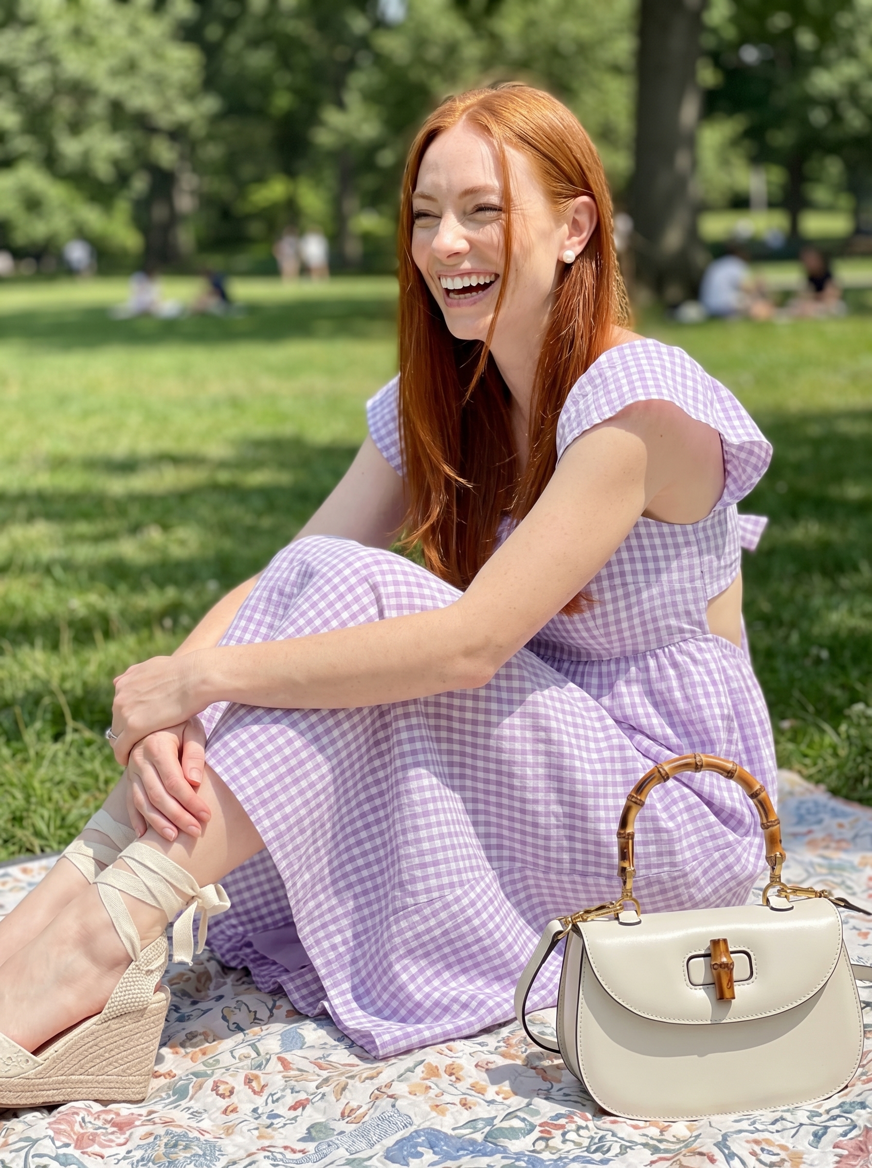 Lavender gingham tiered midi dress, espadrille wedge sandals, and a structured top handle bag create sweet cute outfits for summer 2026, perfect for a park picnic.