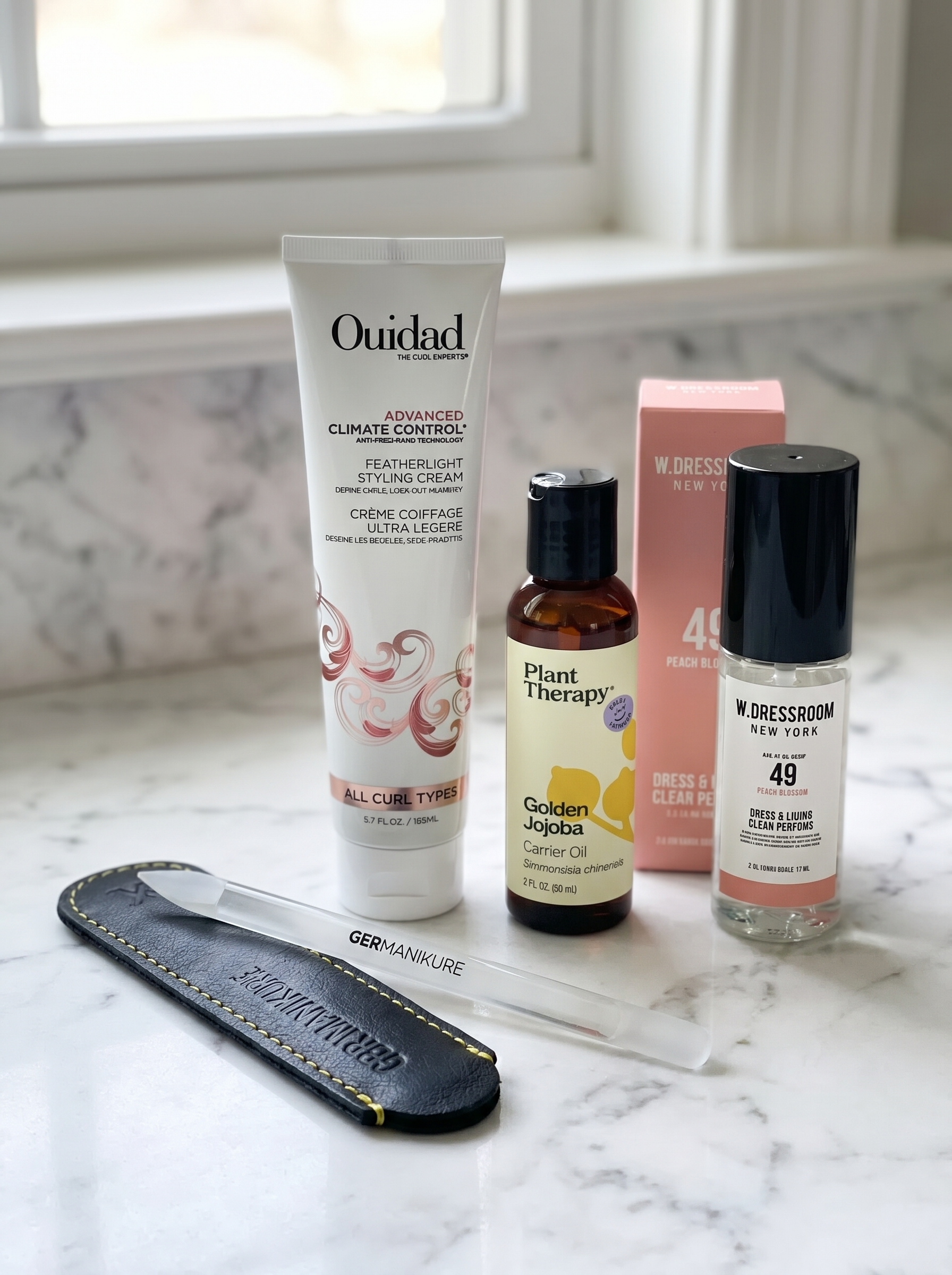 Bohemian Micro-Braid Accents enhancing air-dried waves, a relaxed and playful easy summer hairstyle 2026. Features clear mini elastics and lightweight hair oil, perfect for casual outings or festivals.