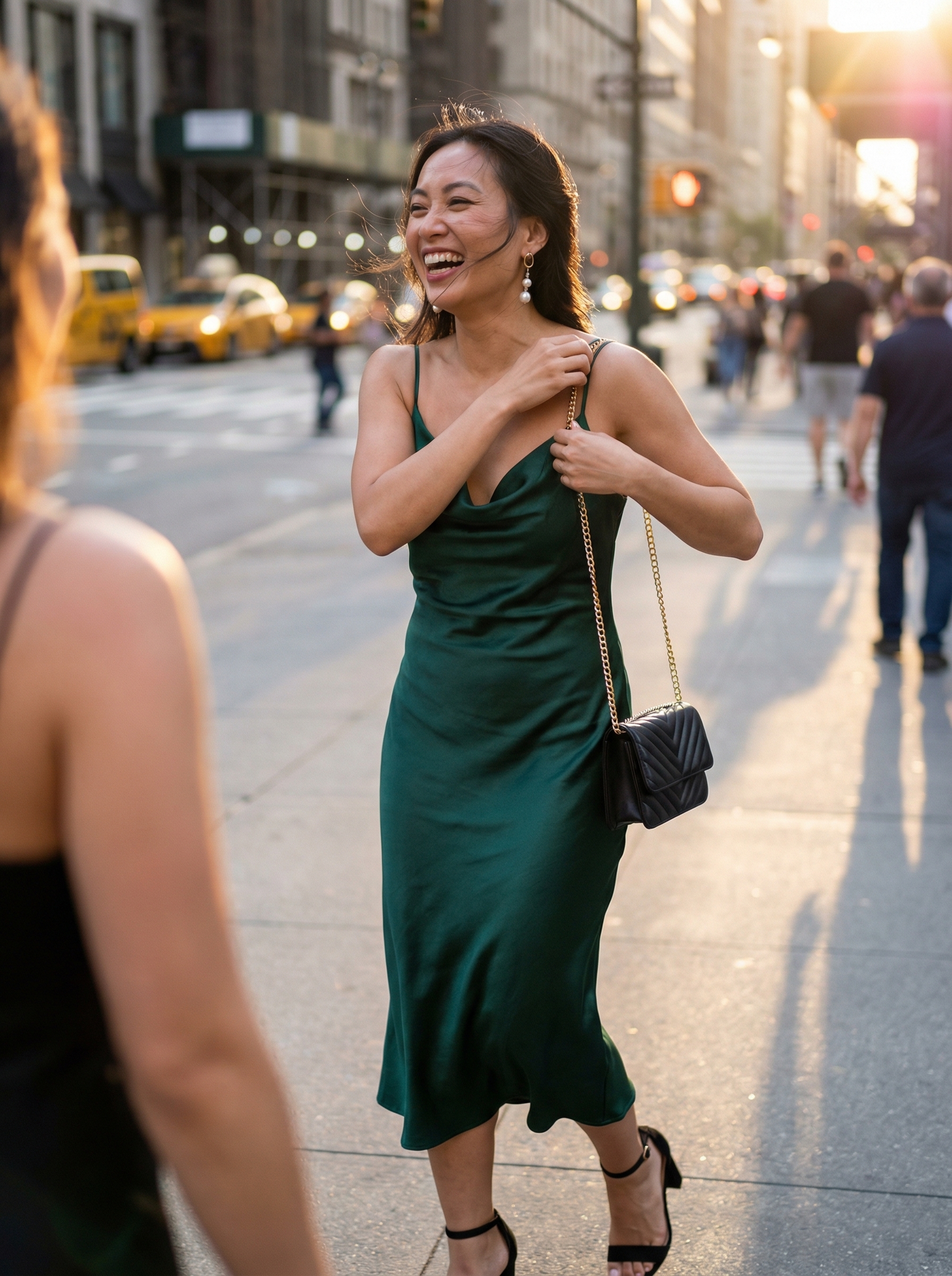 Sophisticated emerald green satin midi slip dress for a gallery opening, perfect for European summer outfits 2026. Paired with black strappy heels and gold pearl earrings.