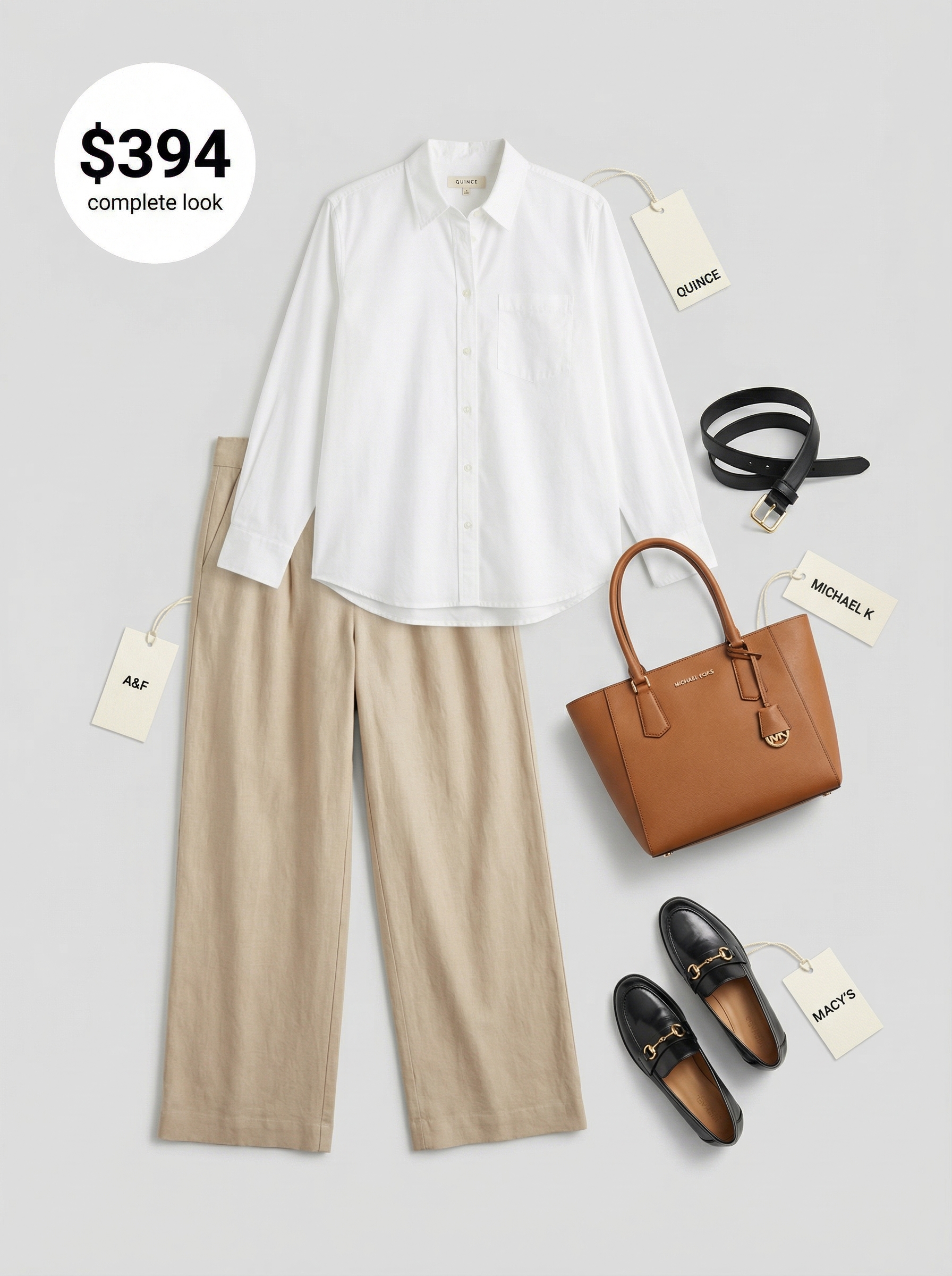 Polished cream linen blend wide-leg trousers and a navy blue oversized button-down shirt for European summer outfits 2026, ideal for a Parisian cafe morning.