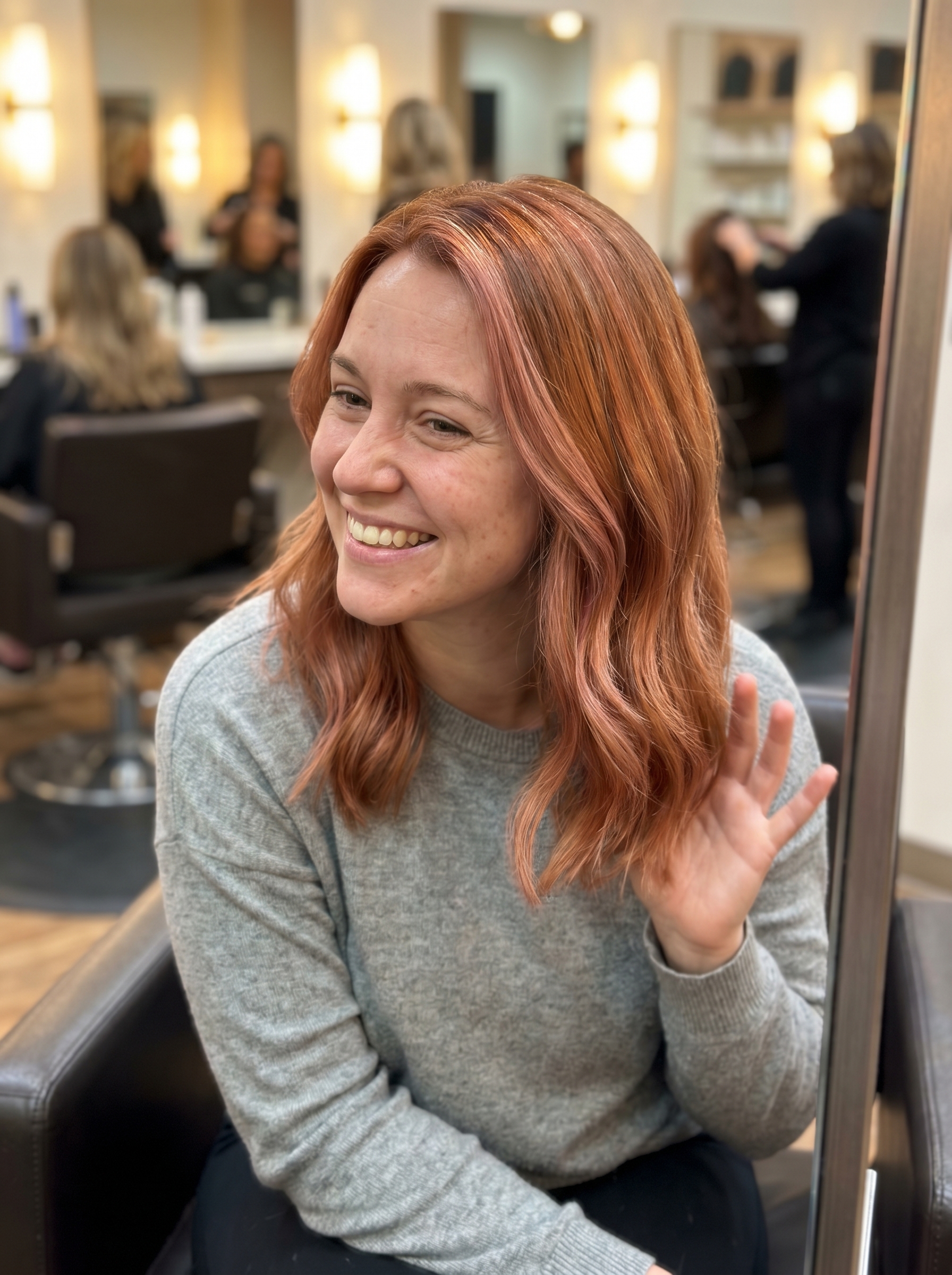 Playful strawberry copper glaze hair in soft copper and rose gold tones, perfect for a fresh everyday or vacation look.