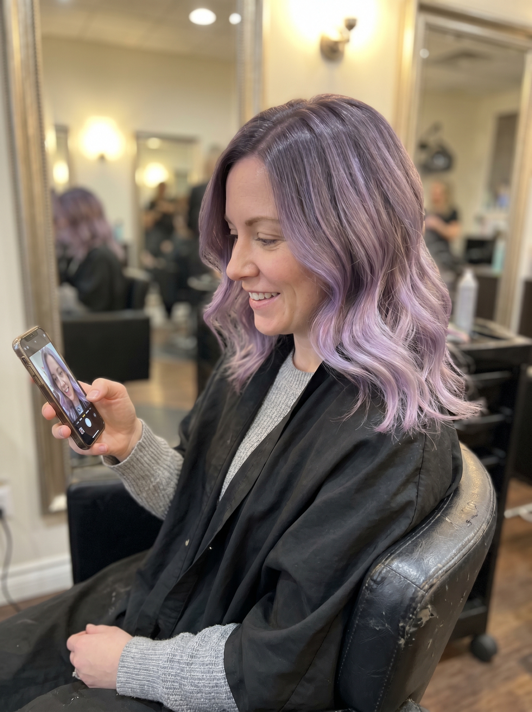 Dreamy Smoky Lilac Ombre, a unique summer hairstyle for medium hair 2026, transitions from ash brown to pastel purple, perfect for festivals and creative expression, using color-depositing shampoo.