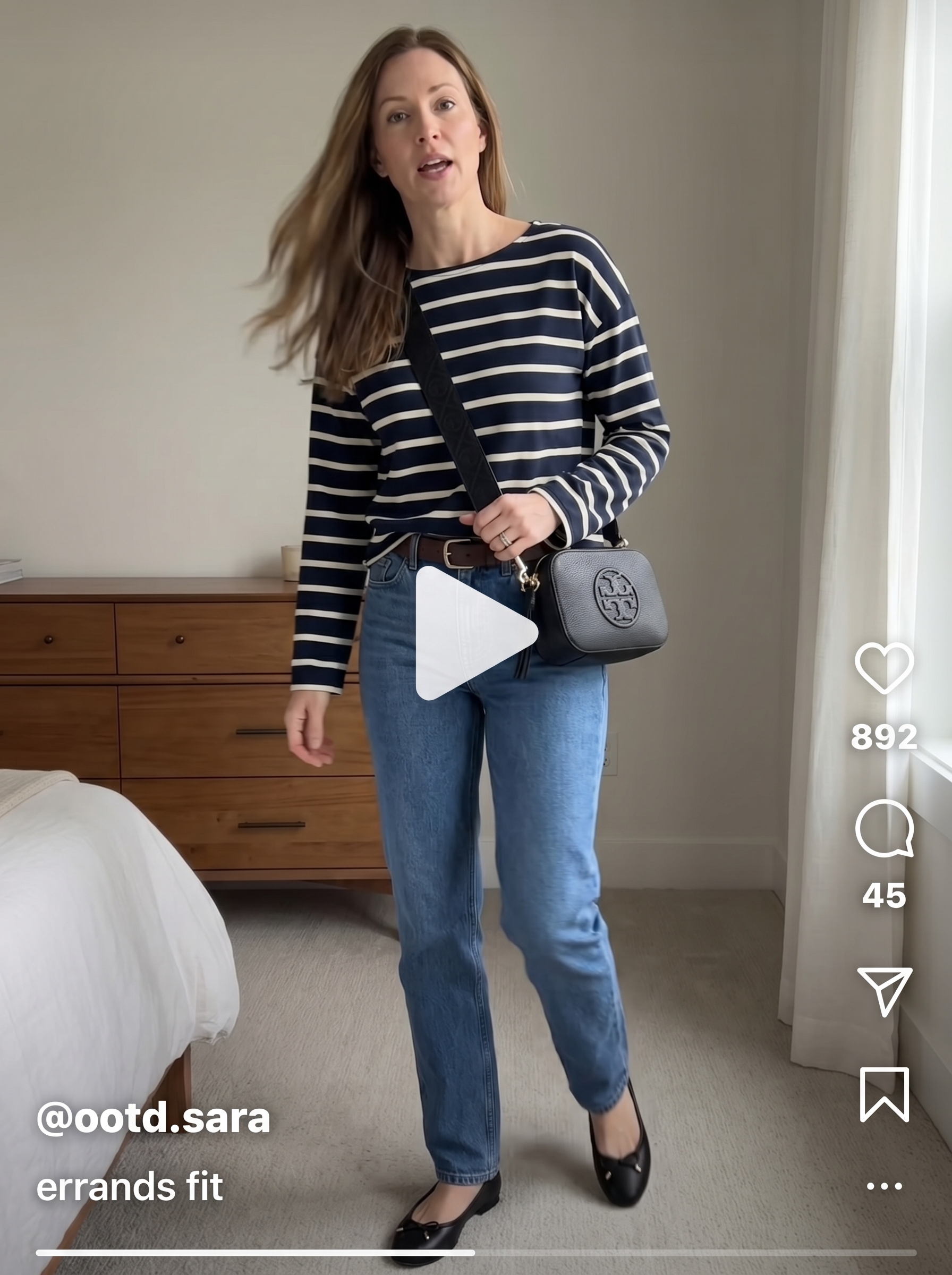 Classic casual chic summer mom outfit 2026 with mid-wash straight-leg jeans, a navy and white striped Breton t-shirt, a black leather crossbody, and black ballet flats. Great for errands or coffee.