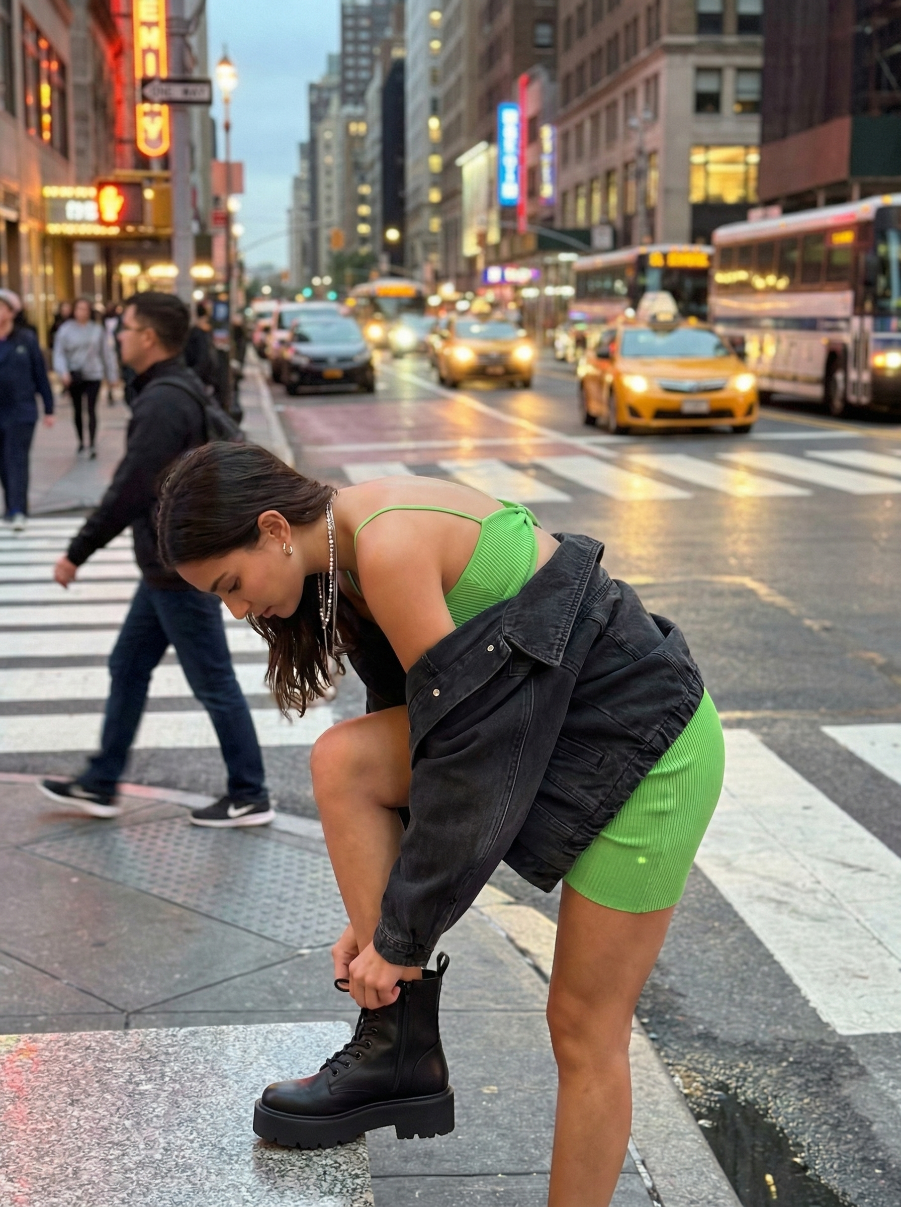 Neon Pop Summer Streetwear Outfit 2024 Bold neon green bodycon mini dress with black platform combat boots and an oversized denim jacket, perfect summer streetwear for a concert or night out.
