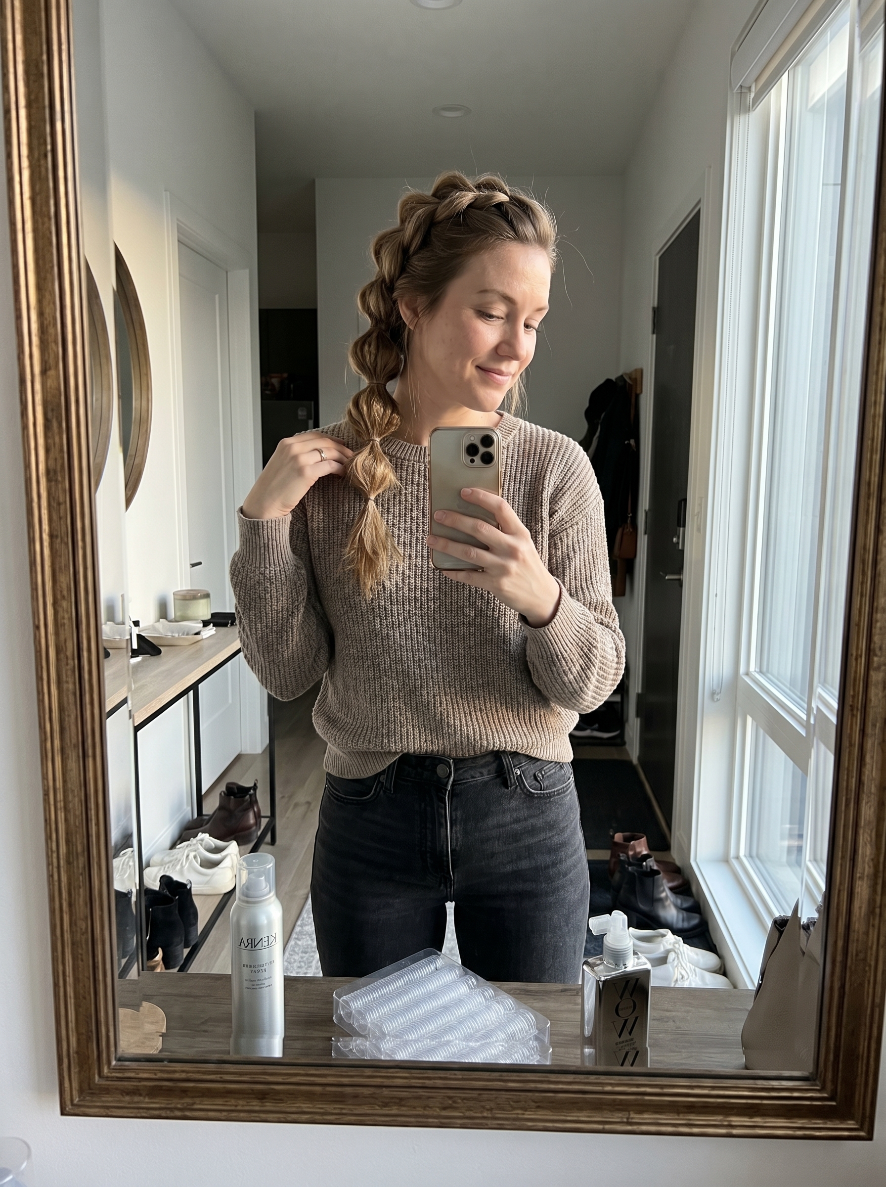 A close-up of a textured bubble braid 2.0 with internal crimping, showcasing a playful and sculptural elegant updo perfect for a summer wedding guest hair 2026.