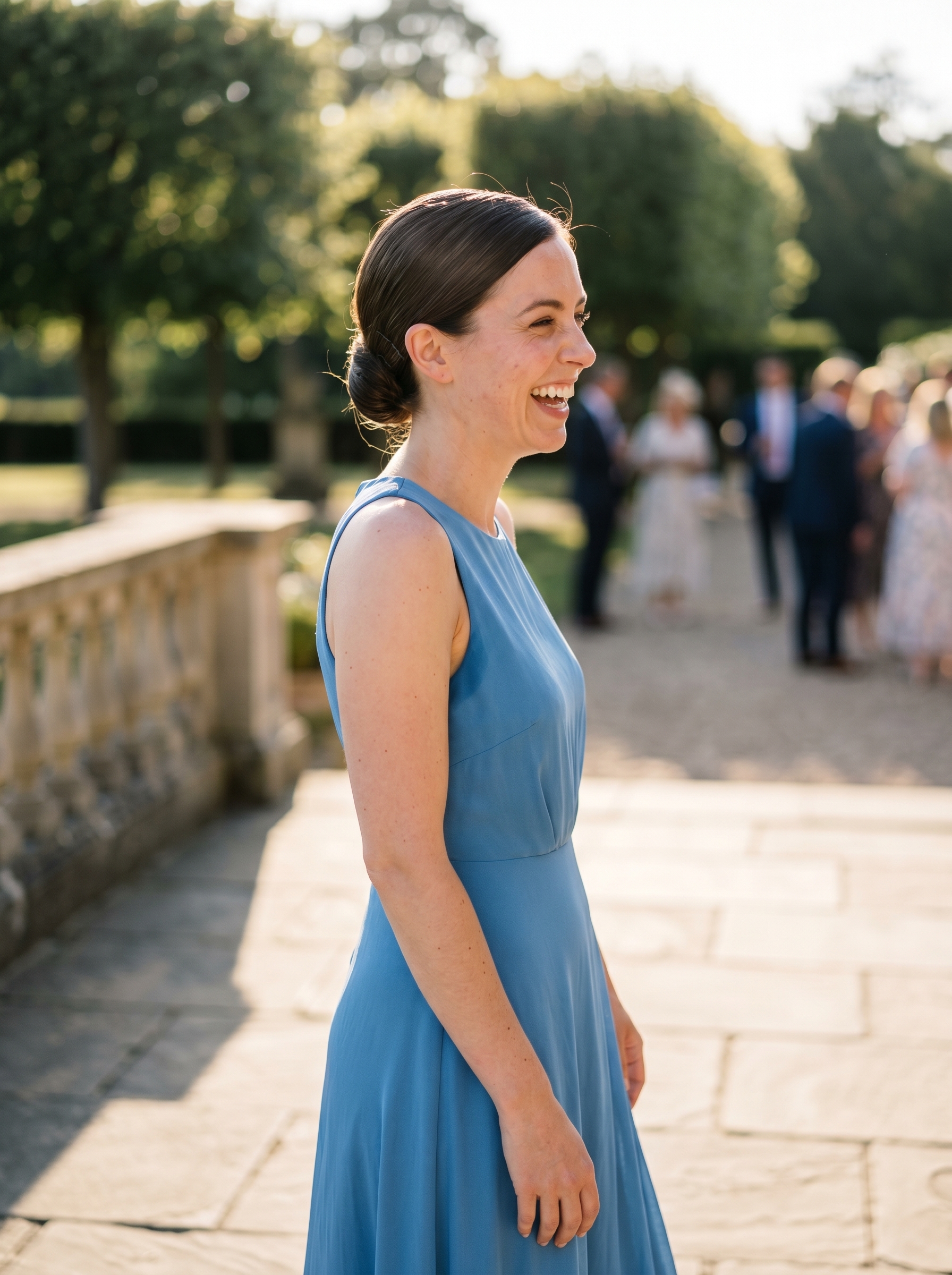 Elegant glass low bun featuring invisible pins for a polished finish, a sophisticated choice for summer wedding guest hair 2026. This sleek style is achieved with anti-humidity sealant and high-shine spray.