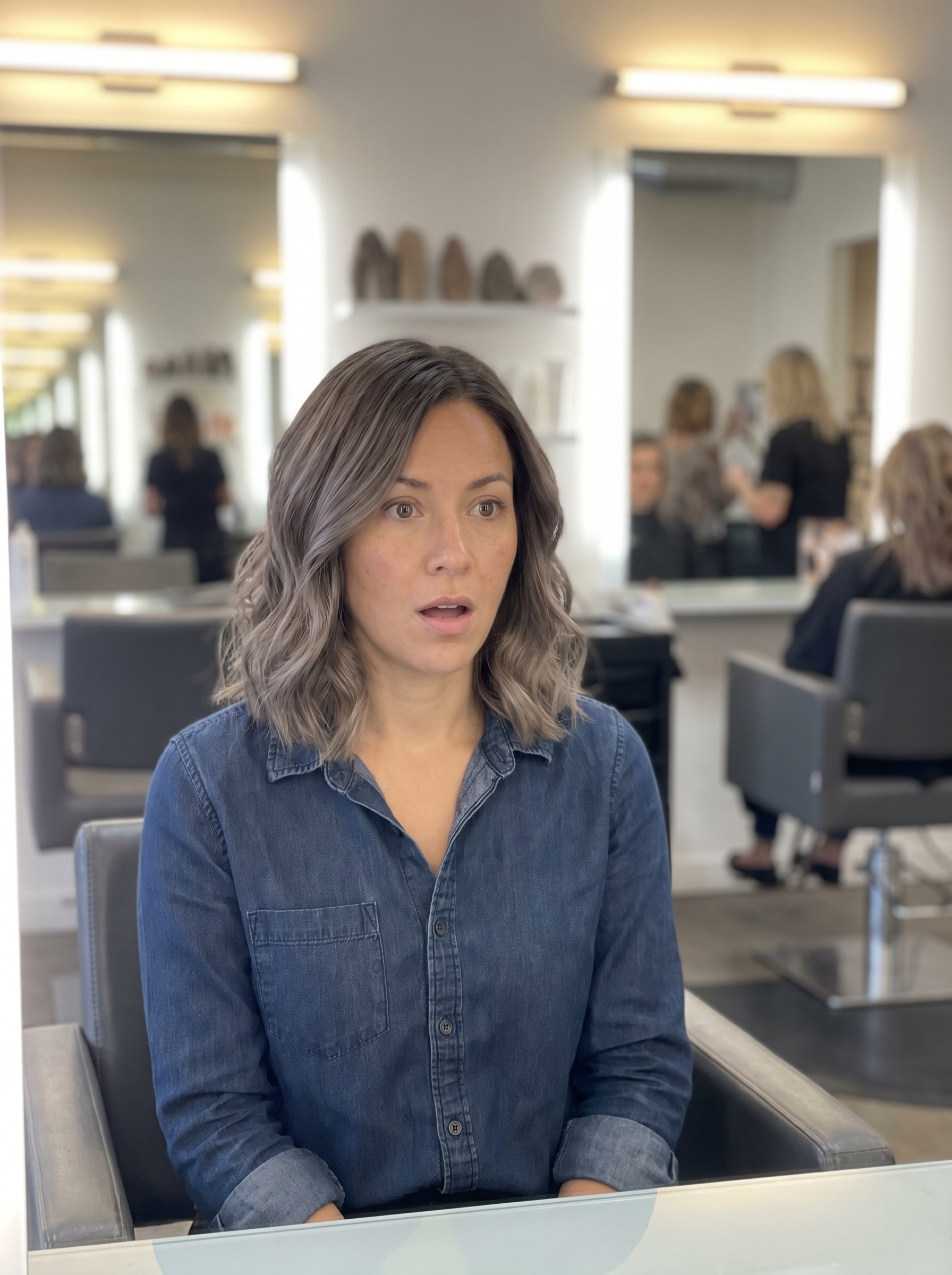Modern ash mushroom root smudge, an effortless true summer hair color 2026, blending ash taupe and cool blonde with a blue toning mask.