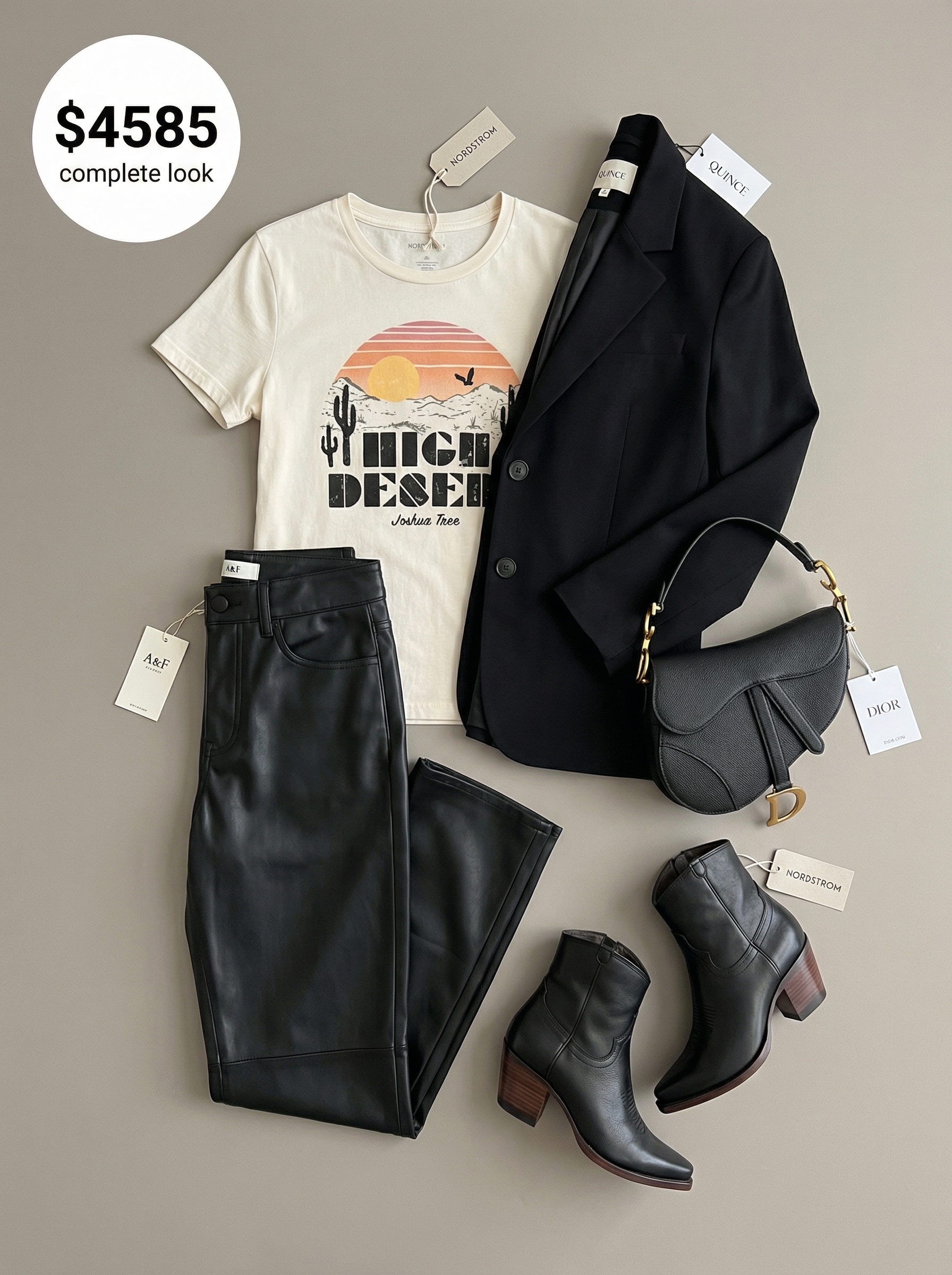 An edgy western chic outfit showcasing a black oversized blazer over a cream desert landscape graphic tee, black faux leather pants, and pointed-toe ankle boots. This sophisticated look is ideal for an evening out or dinner with friends.