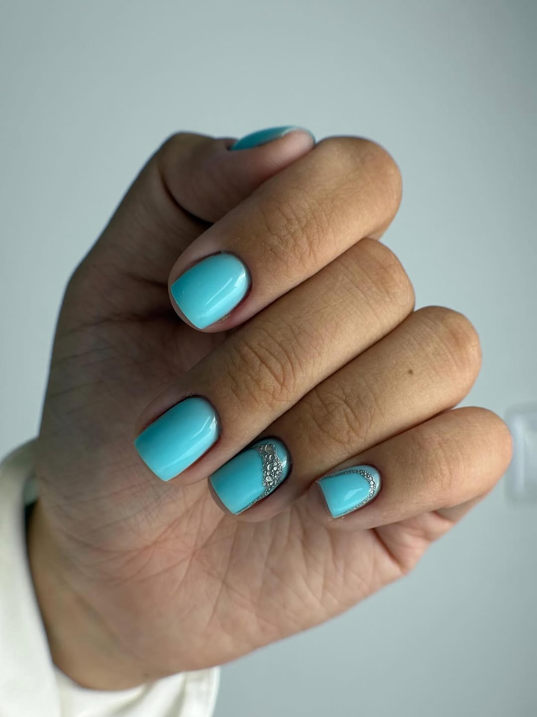 Aqua Blue Gel Nails With Silver Glitter Accent