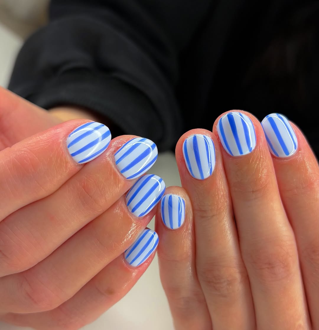 Blue and White Striped Glossy Oval Nails