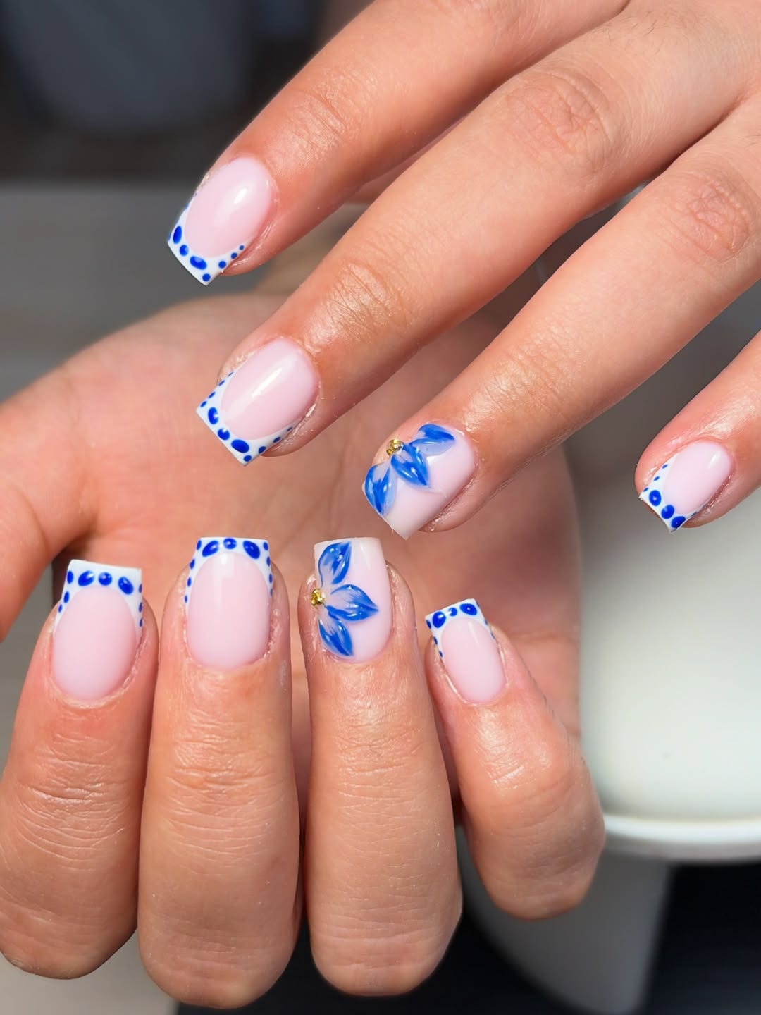 Blue Dotted French Tips with Floral Accent