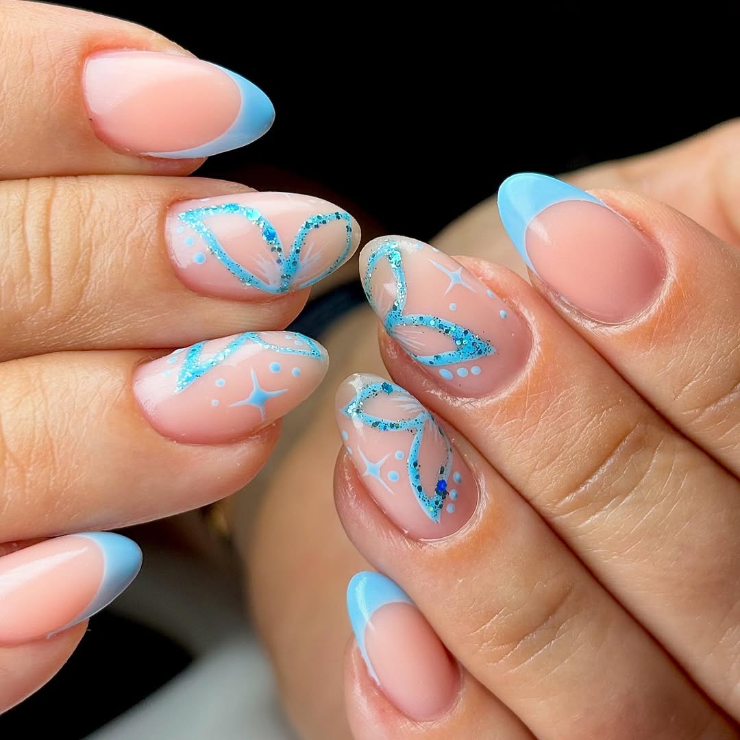 Blue French Tips with Glitter Butterfly and Star Accents