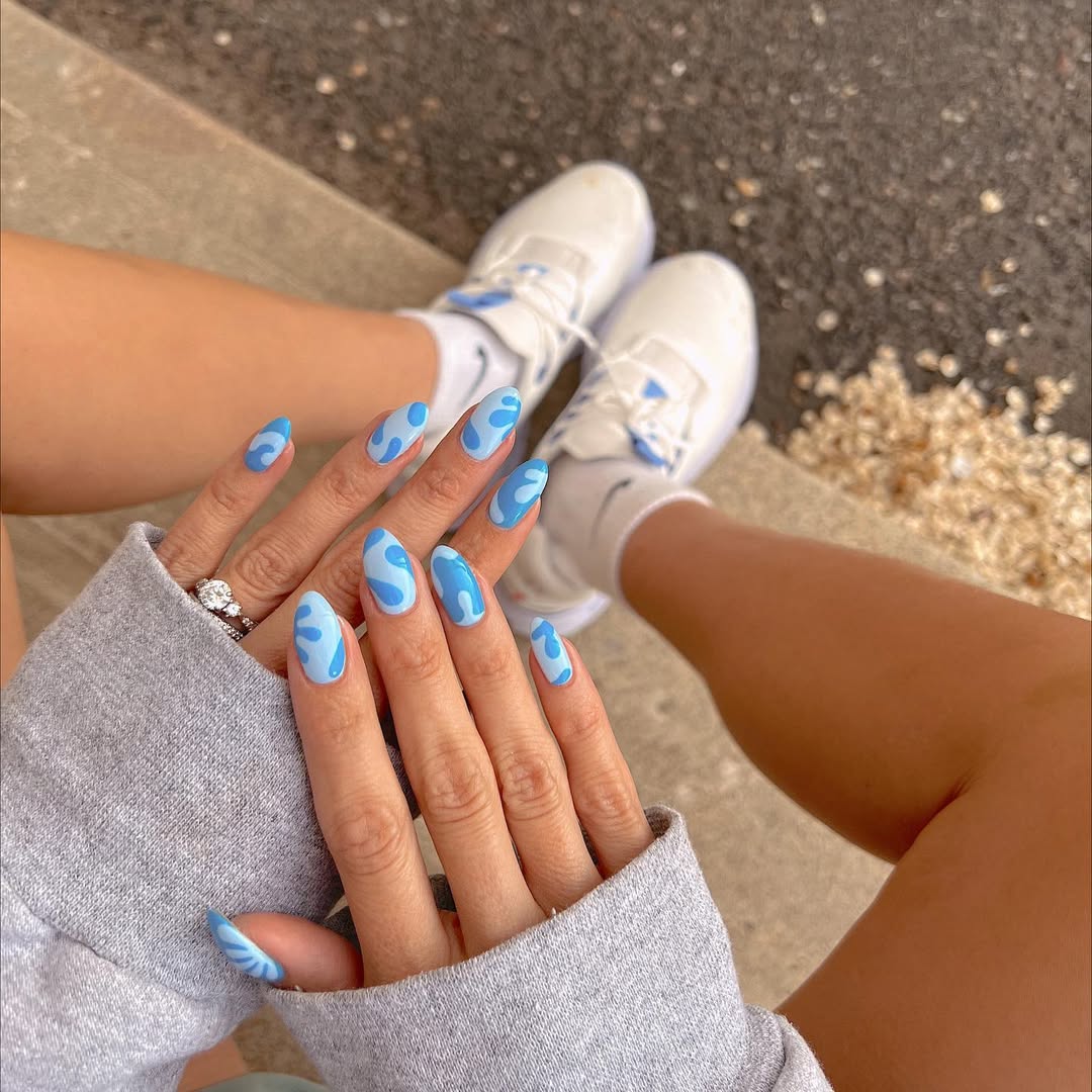 Blue Wavy Swirl Glossy Almond Nails