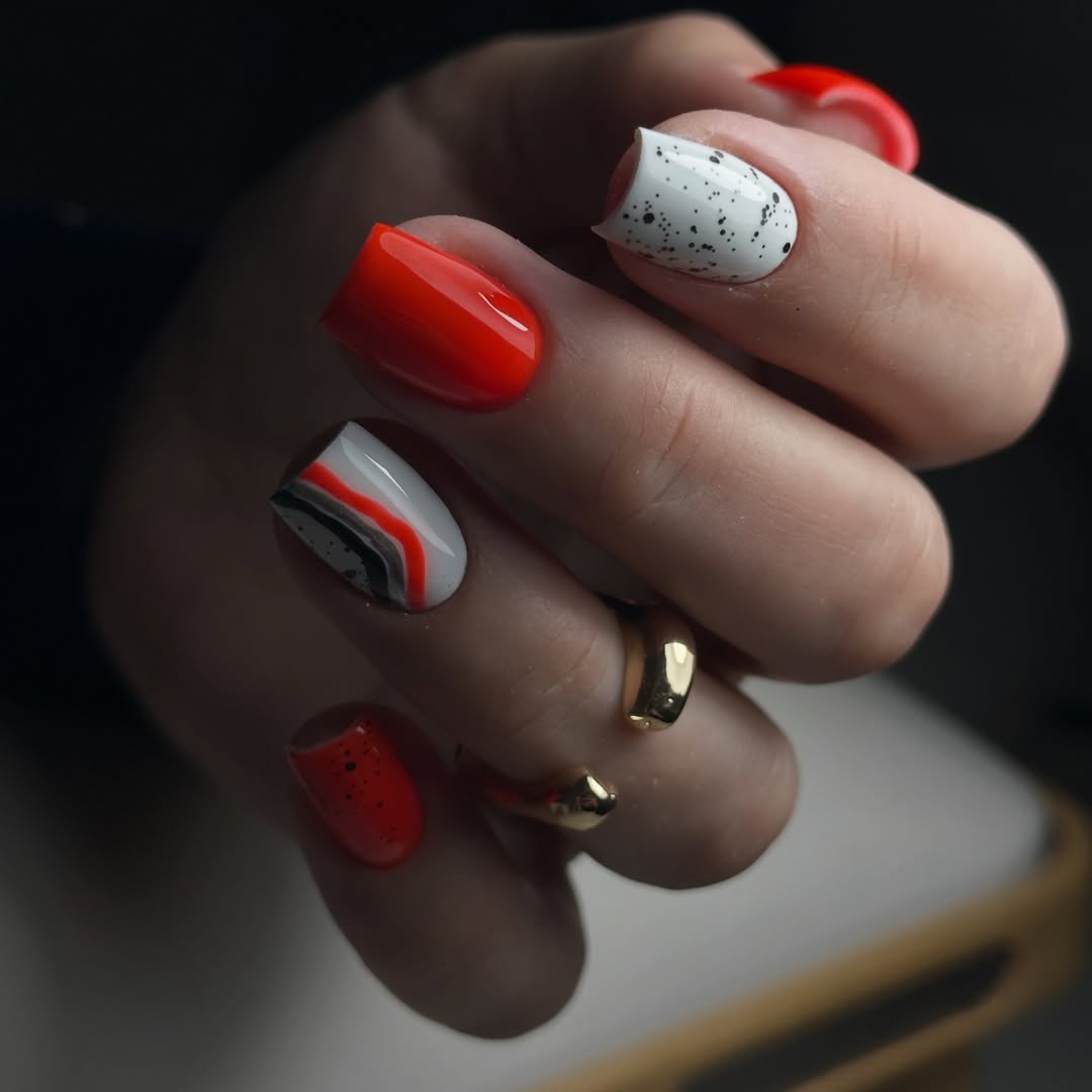 Bold Orange White Swirl Speckled Squoval Nails