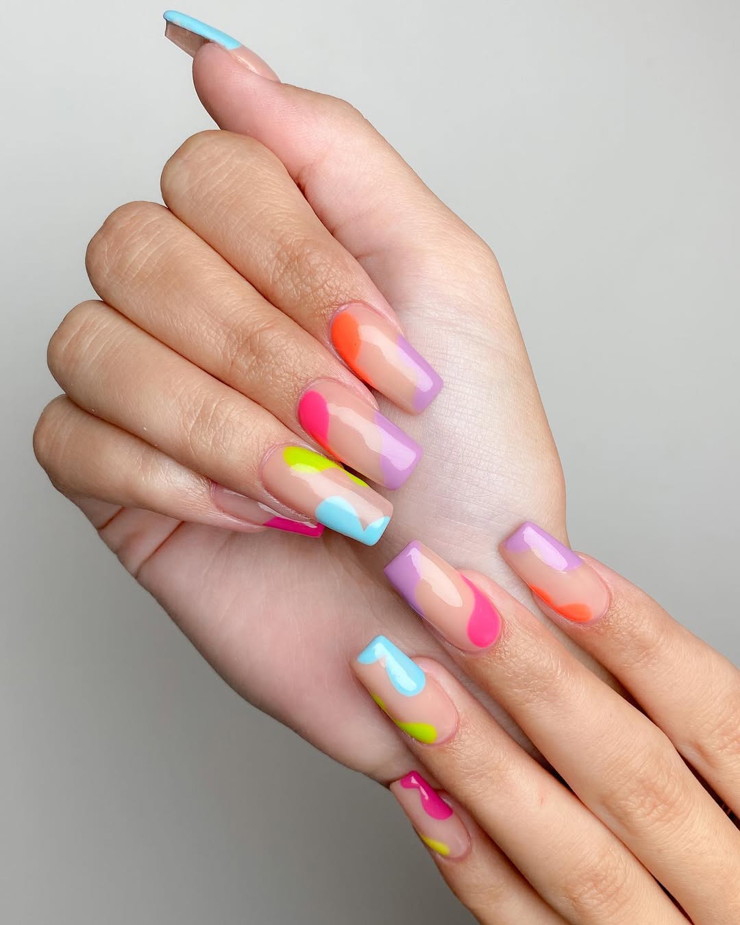 Bright Abstract Swirls on Nude Coffin Nails