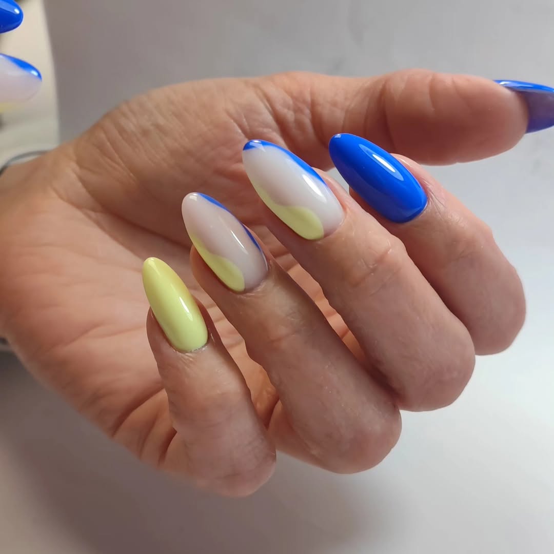 Bright Blue and Pastel Swirl Almond Nails