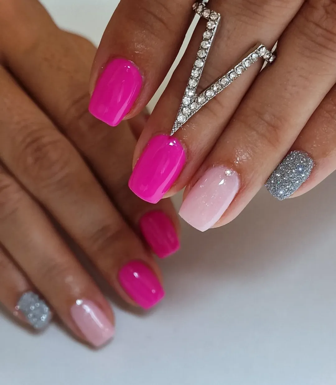 Bright Magenta, Pale Pink, and Silver Glitter Ombre Nails