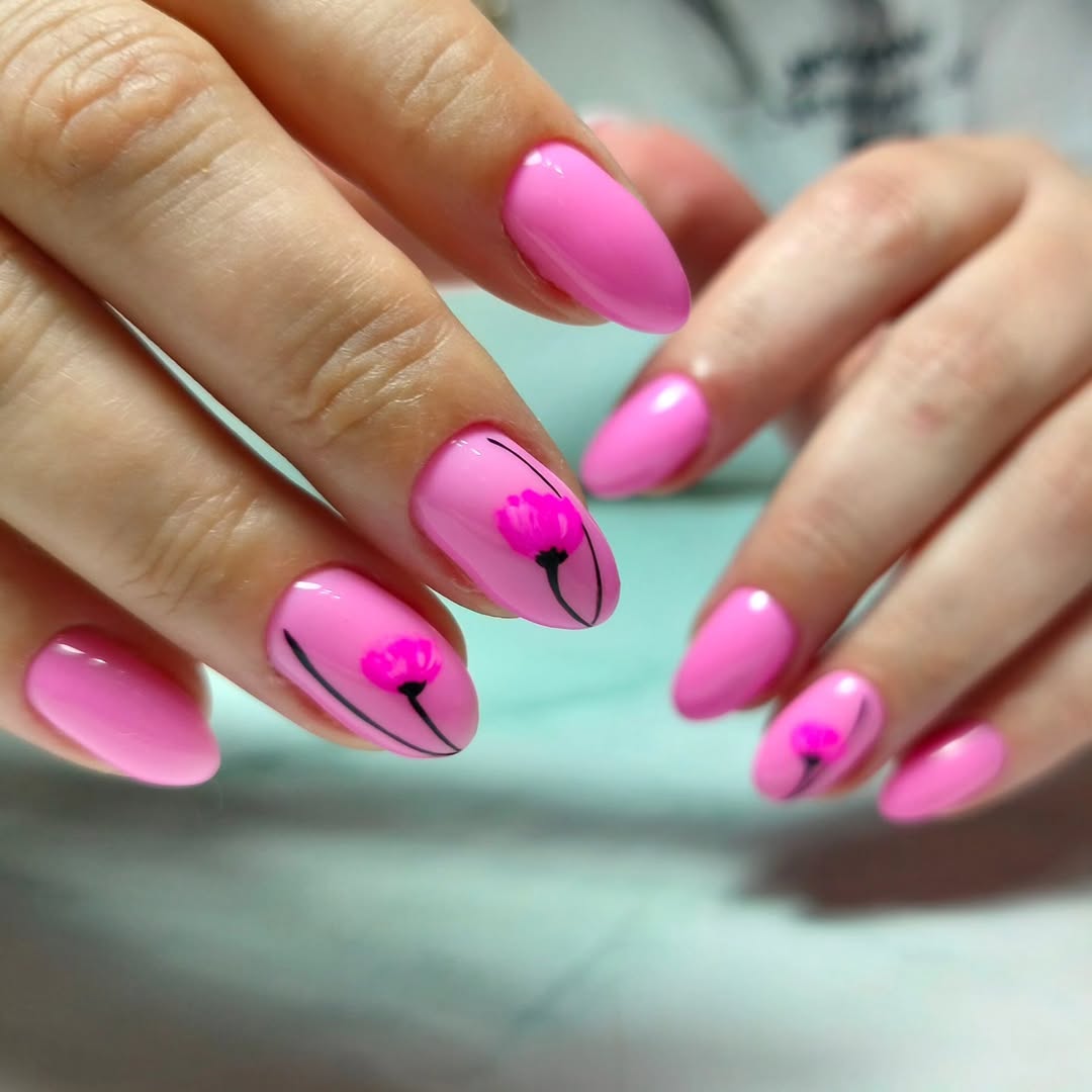 Bright Pink Oval Nails With Delicate Floral Art