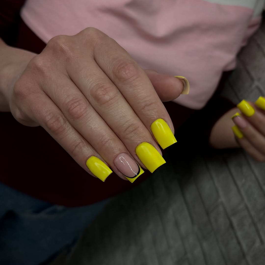 Bright Yellow Glossy Square Nails with Abstract Accent