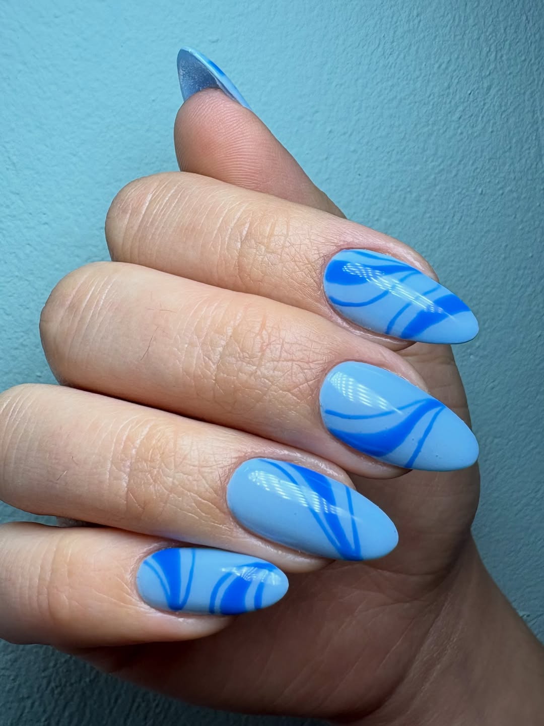 Coastal Blue Swirl Almond Nails