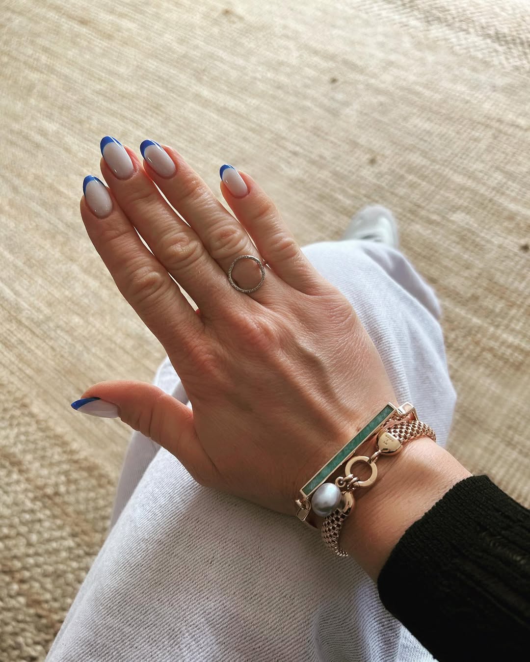 Cool Blue Tip Milky Oval Nails