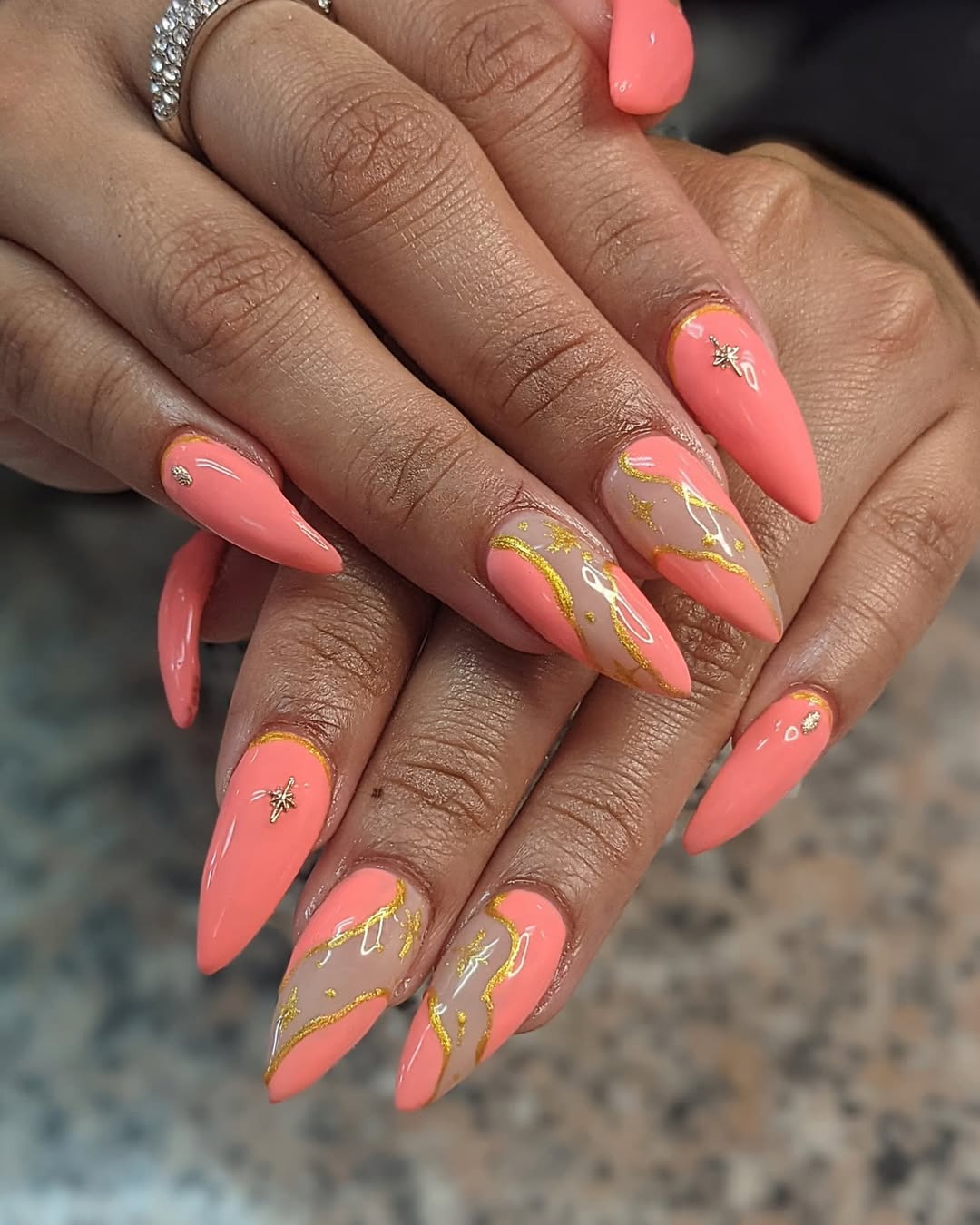 Coral Peach Marble Gold Accent Stiletto Nails