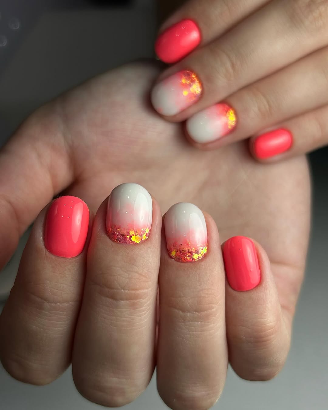 Coral Pink Ombre Short Oval Nails with Glitter