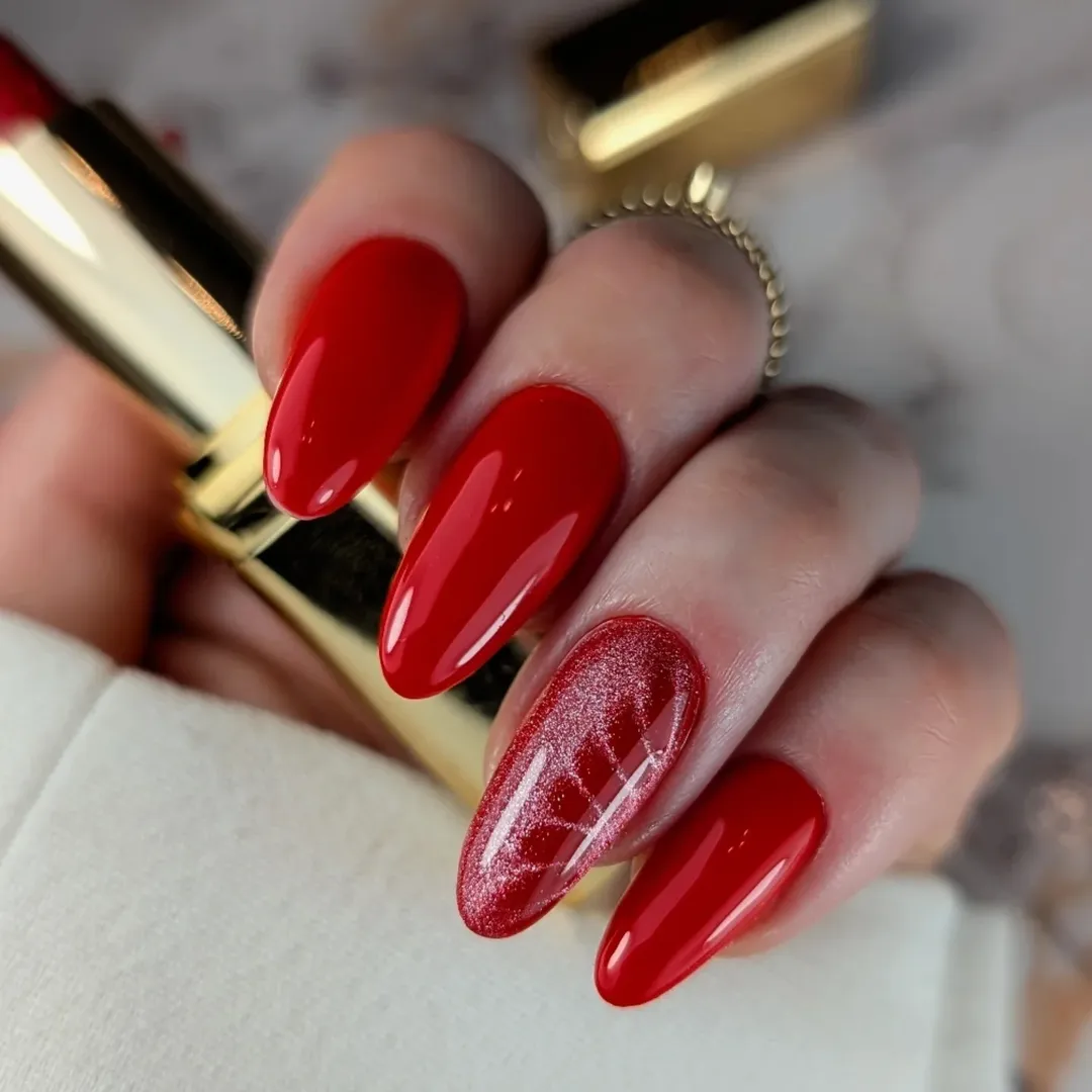 Crimson Jelly Almond Nails with Glitter Accent