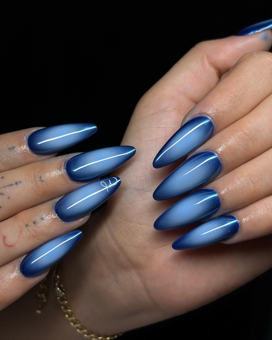 Deep Ocean Blue Cat Eye Stiletto Fade Nails