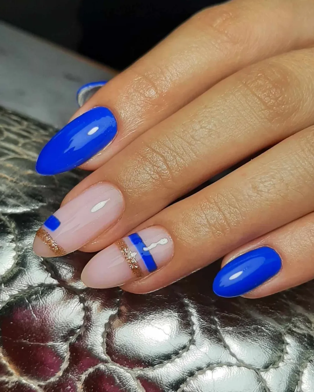 Electric Blue and Gold Abstract Almond Nails