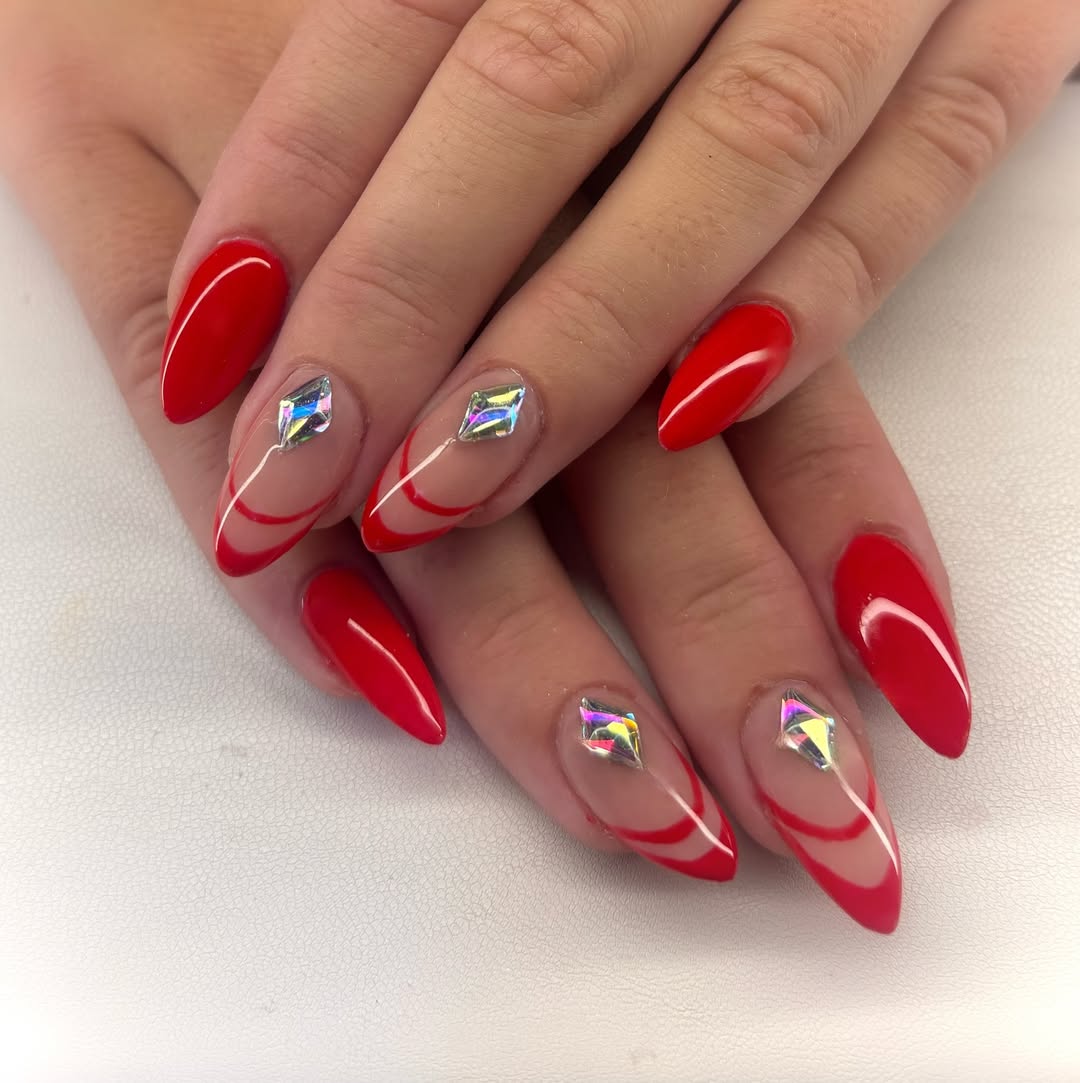 Fiery Red Stiletto Nails with Crystal Accents
