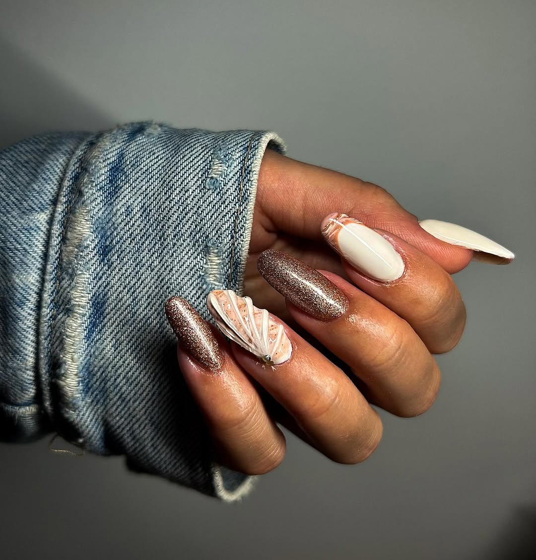 Glam Shimmer Shell Nail Art with 3D Accents