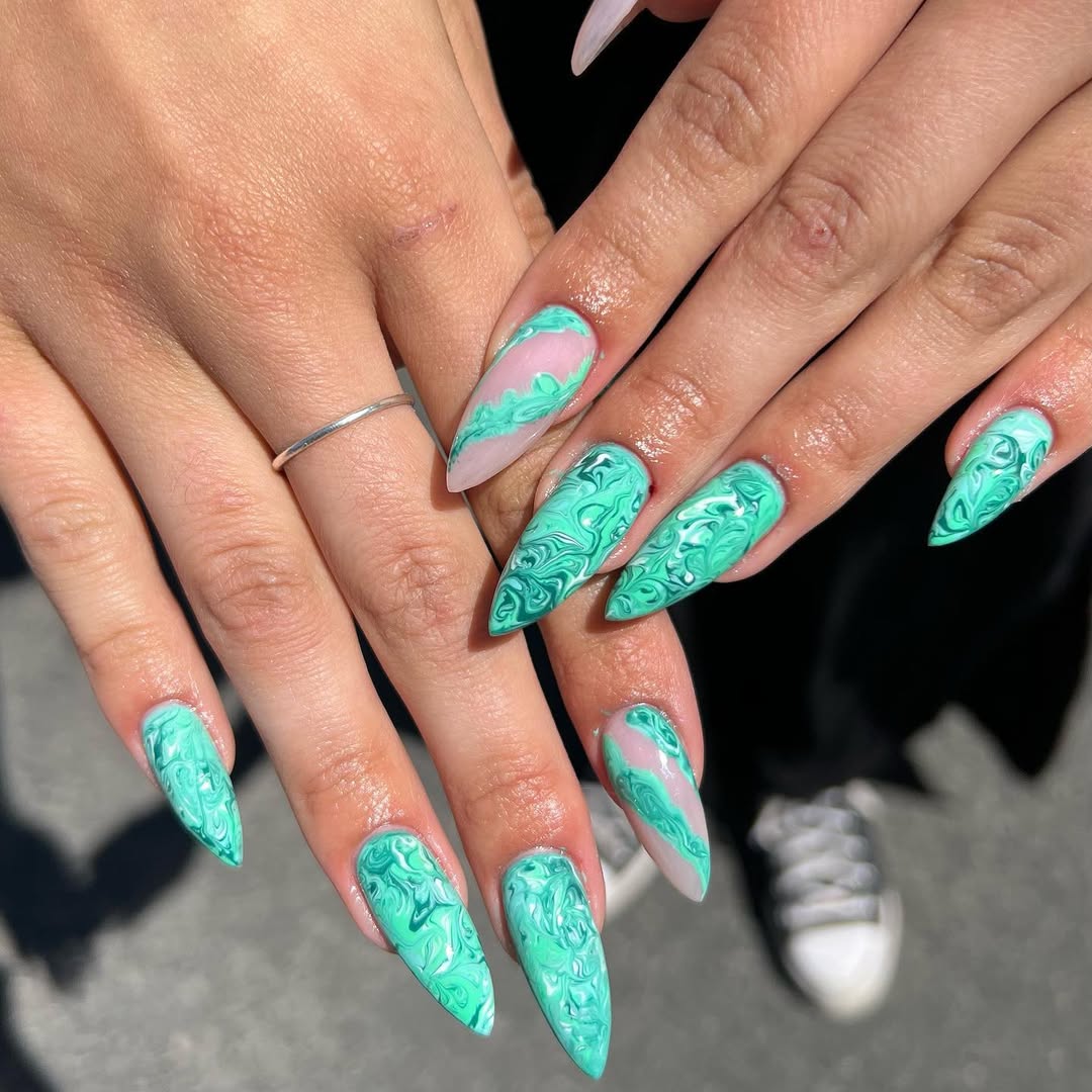 Glamorous Green Swirl Marble Stiletto Nails