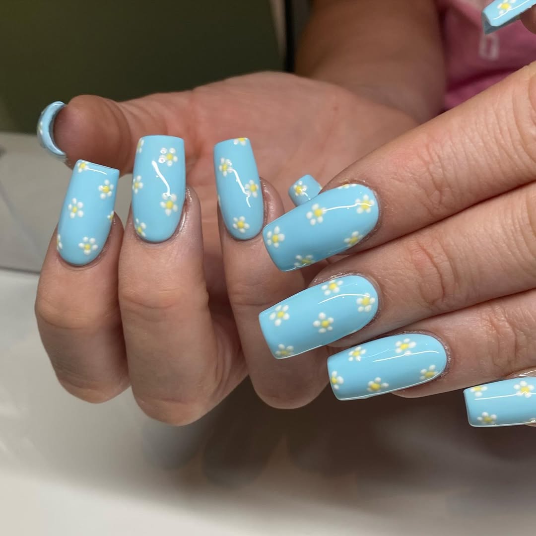 Glossy Baby Blue Daisy Nail Art