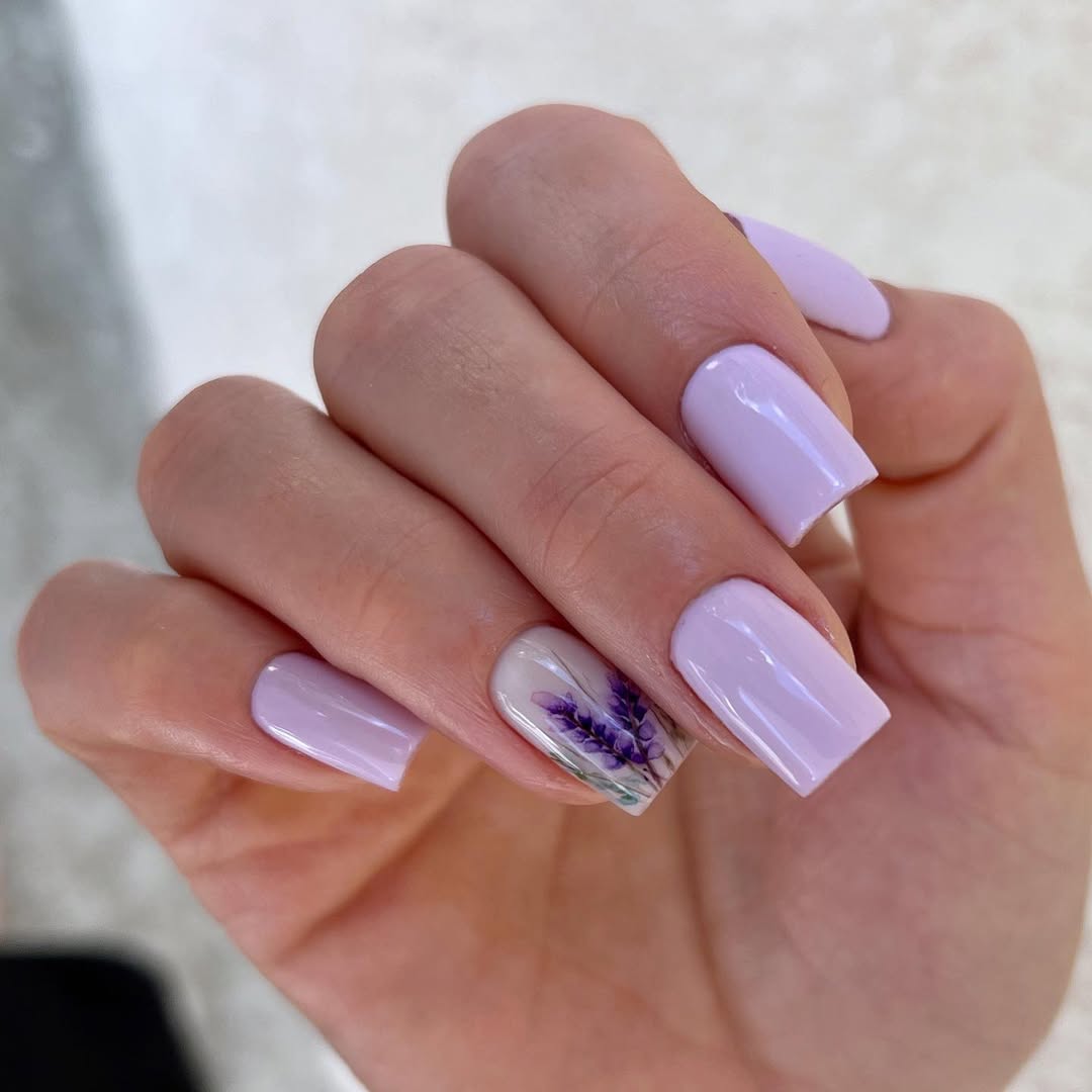 Glossy Lavender Square Nails with Floral Accent