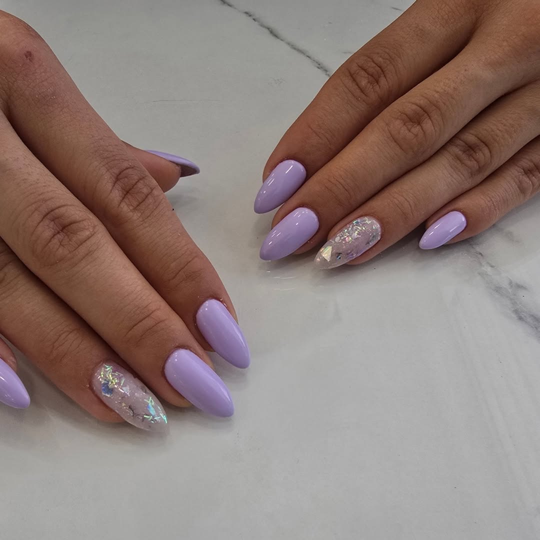 Glossy Lilac Almond Nails with Shard Accent