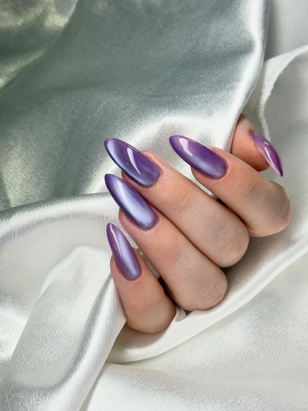 Glossy Lilac Cat Eye Almond Nails