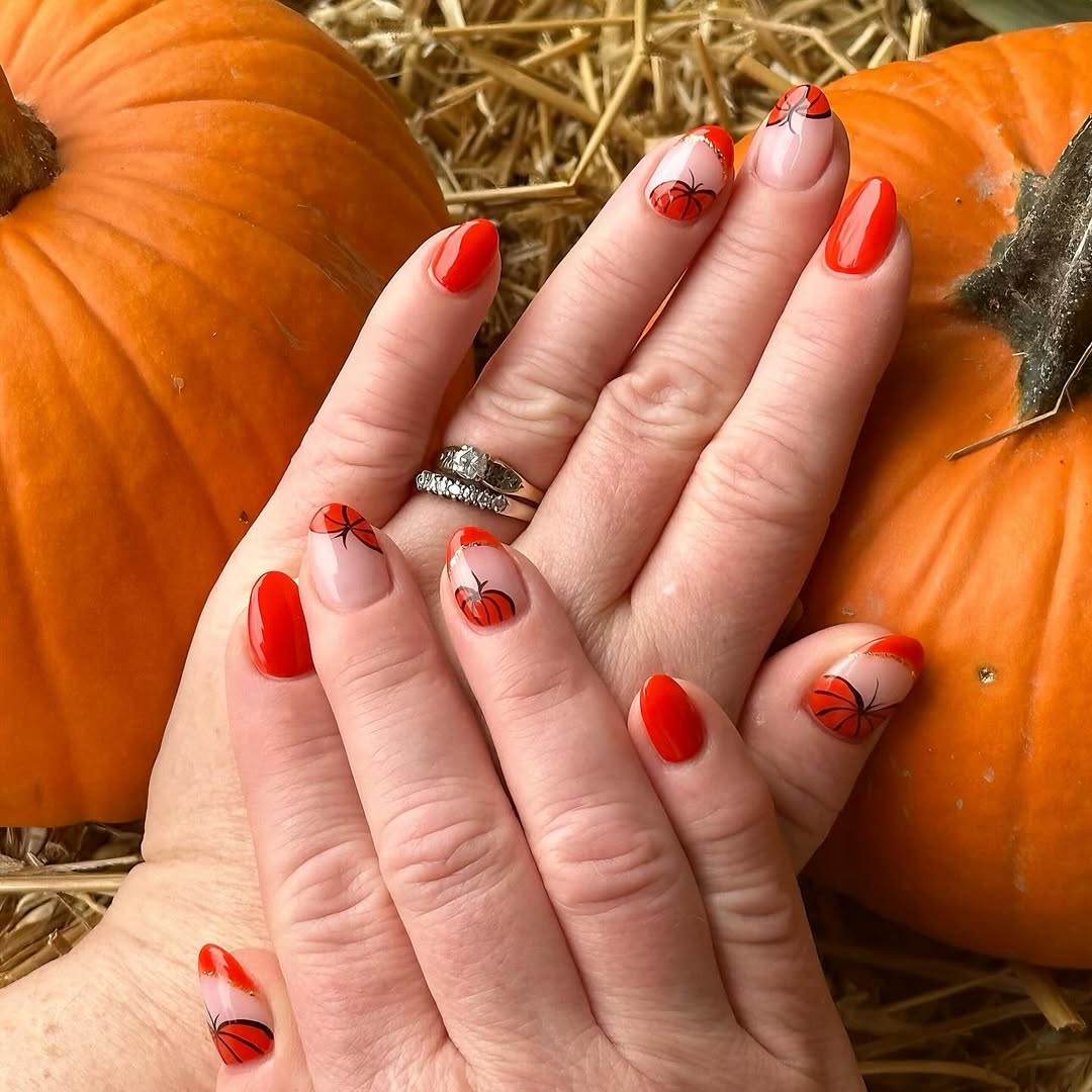 Glossy Nude and Orange Pumpkin Design Almond Nails