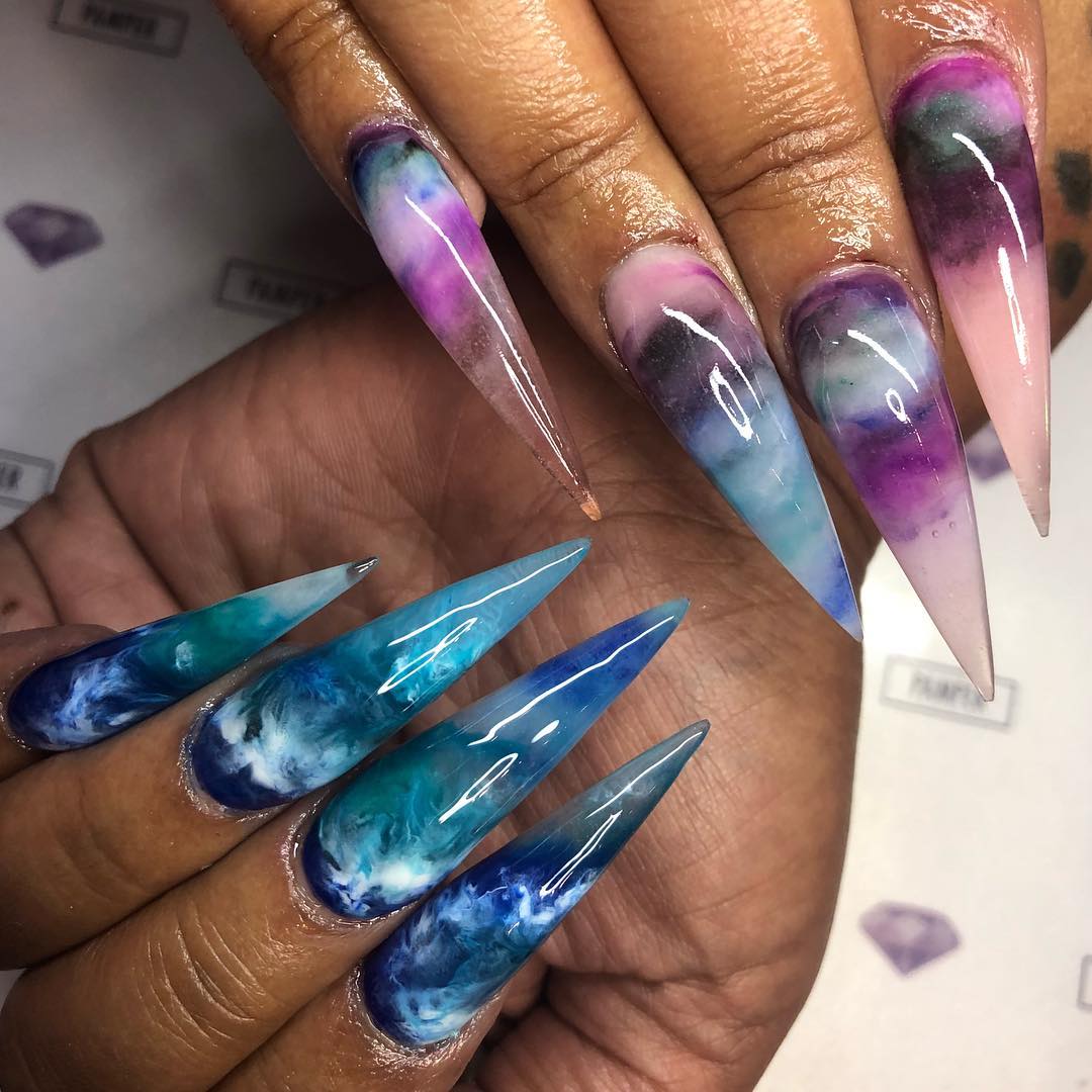 Glossy Ocean Nebula Swirl Stiletto Nails