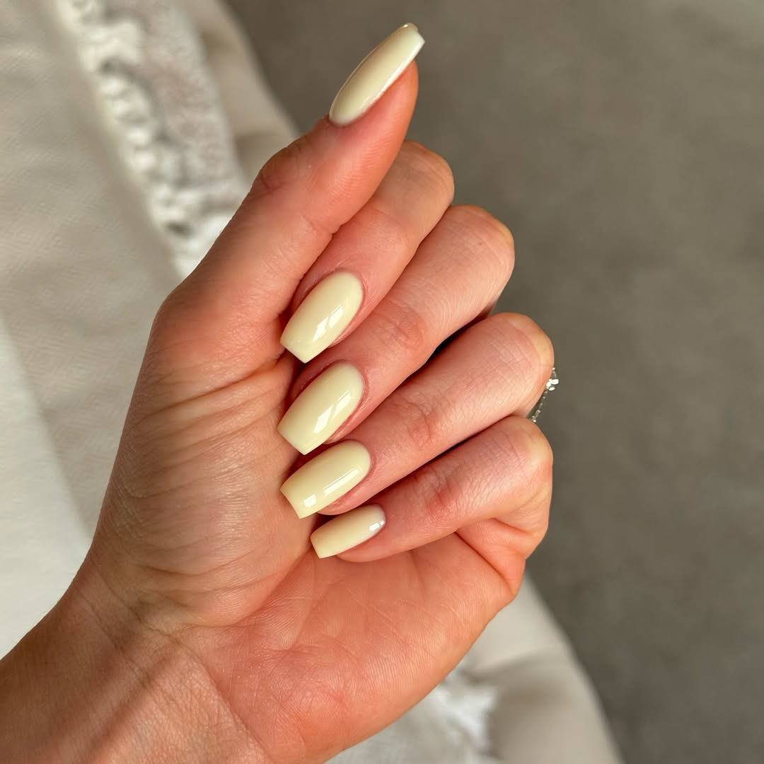 Glossy Pale Yellow Long Coffin Nails