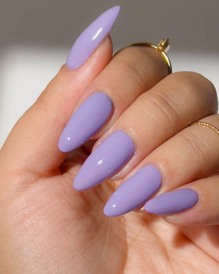 Glossy Pastel Lavender Stiletto Nails