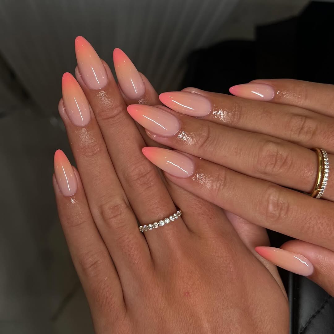 Glossy Peach Pink Gradient Stiletto Nails