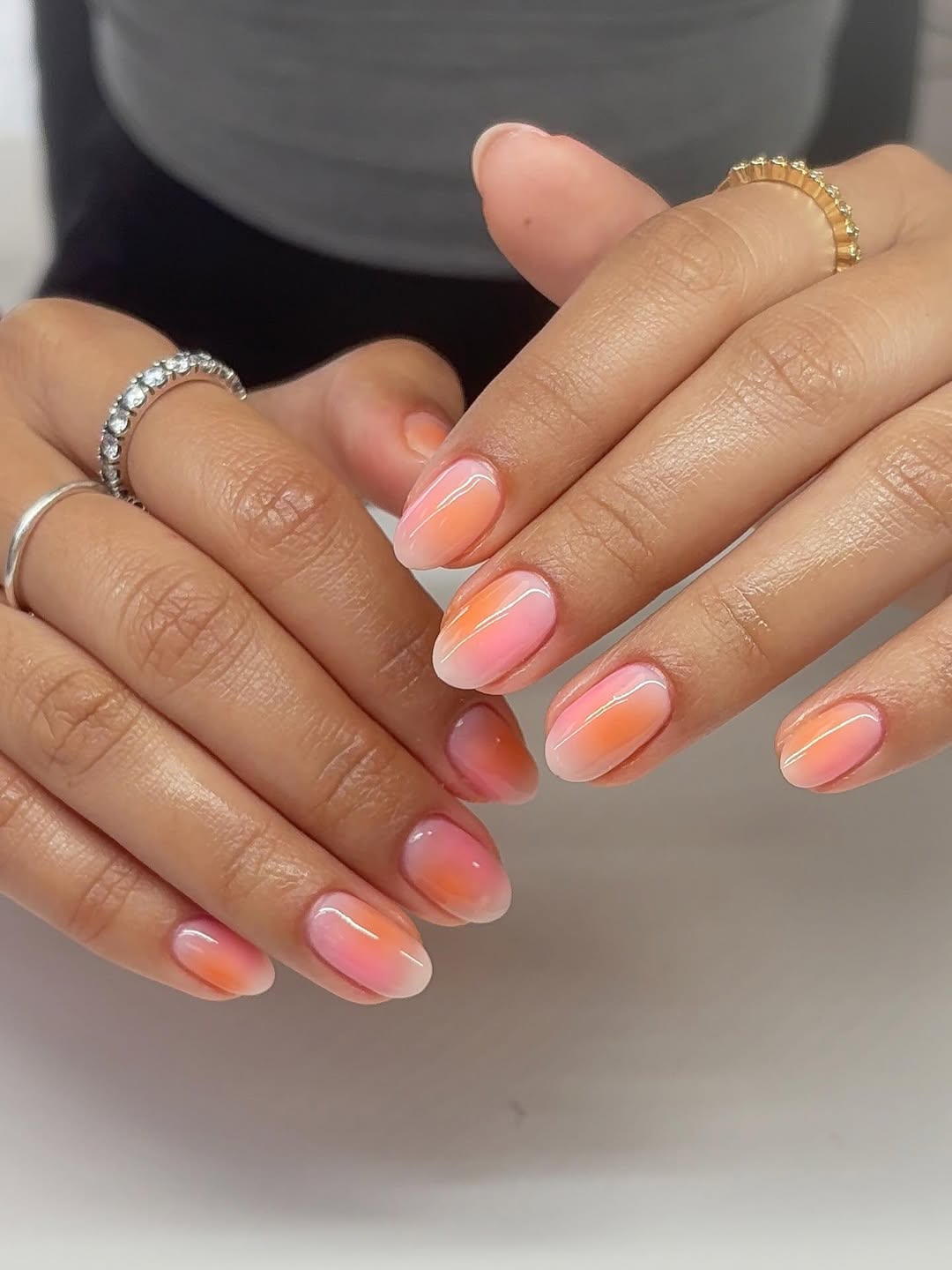 Glossy Pink Orange Gradient Oval Nails