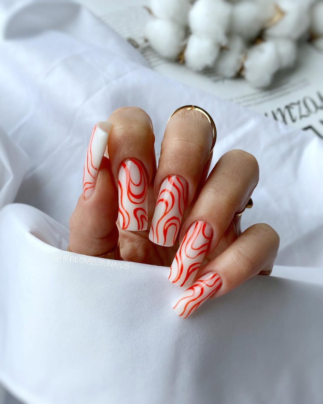 Glossy Red Swirl Long Coffin Nails