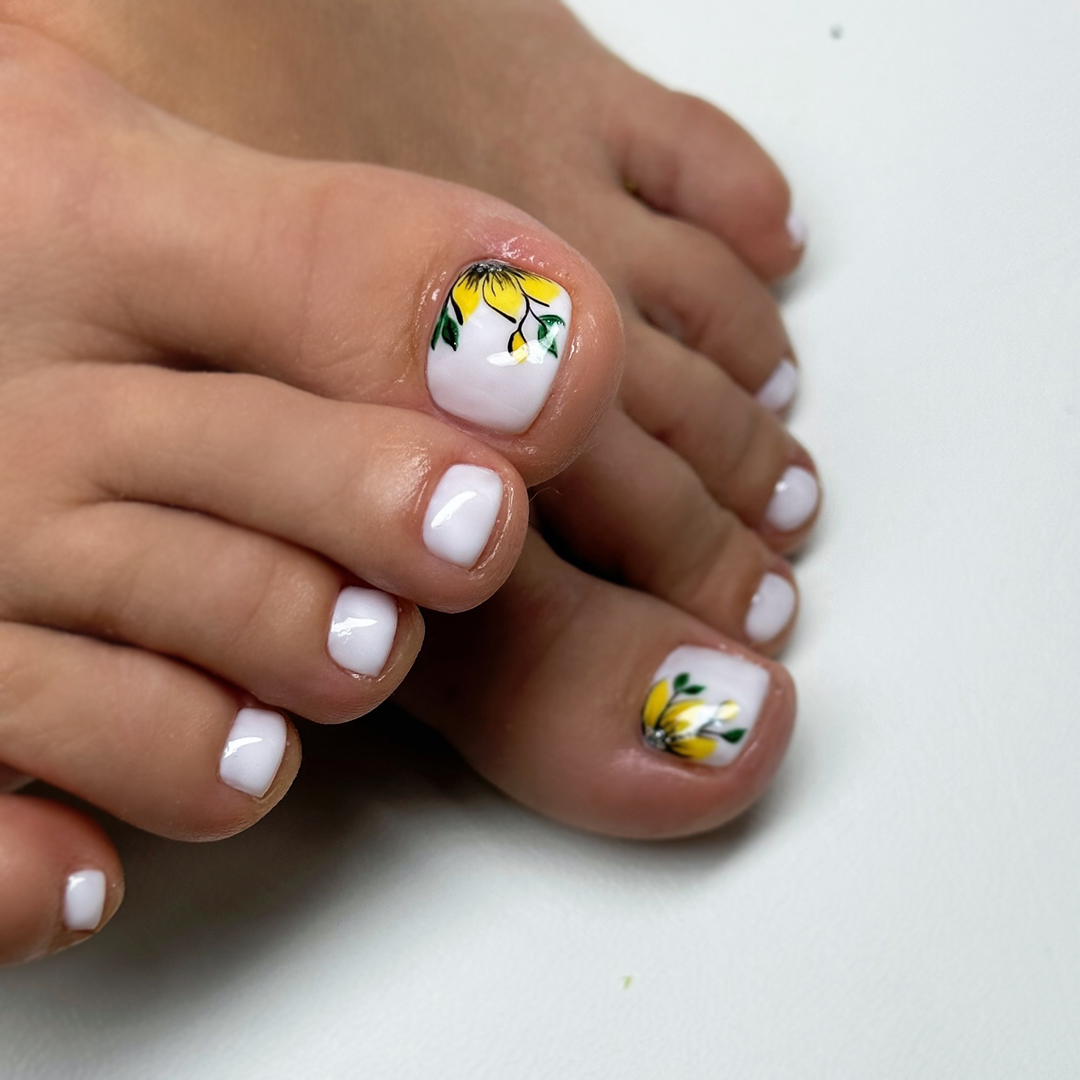 Glossy White Pedicure with Sunflower Hand-Painted Art